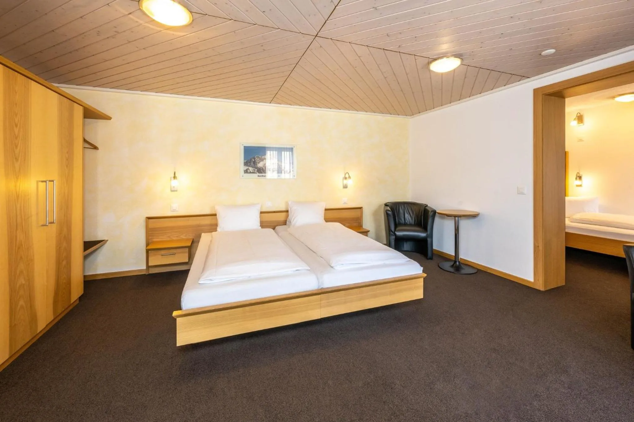 Photo of the whole room, Bed in Aktiv Hotel & Spa Hannigalp