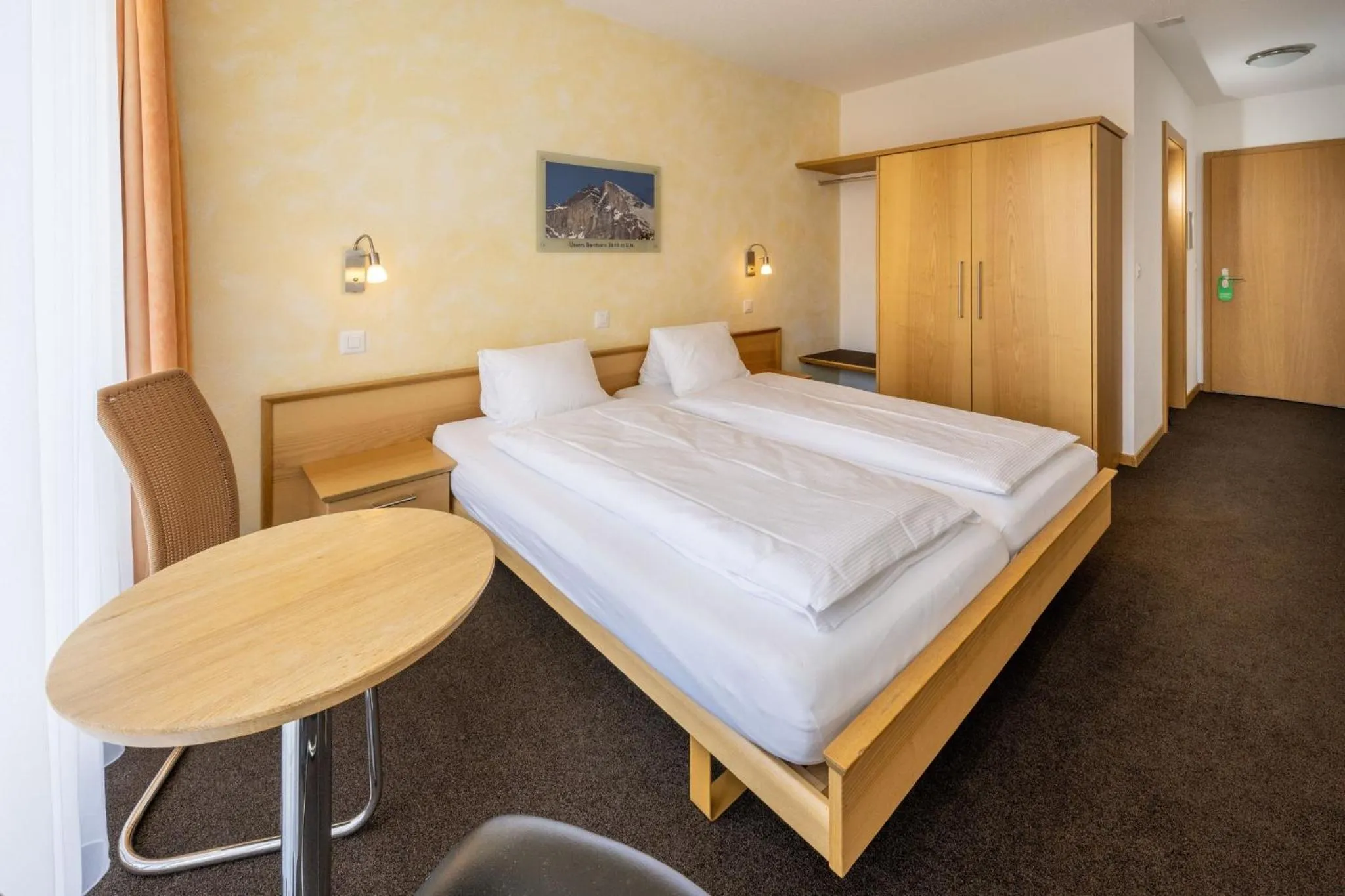 Photo of the whole room, Bed in Aktiv Hotel & Spa Hannigalp