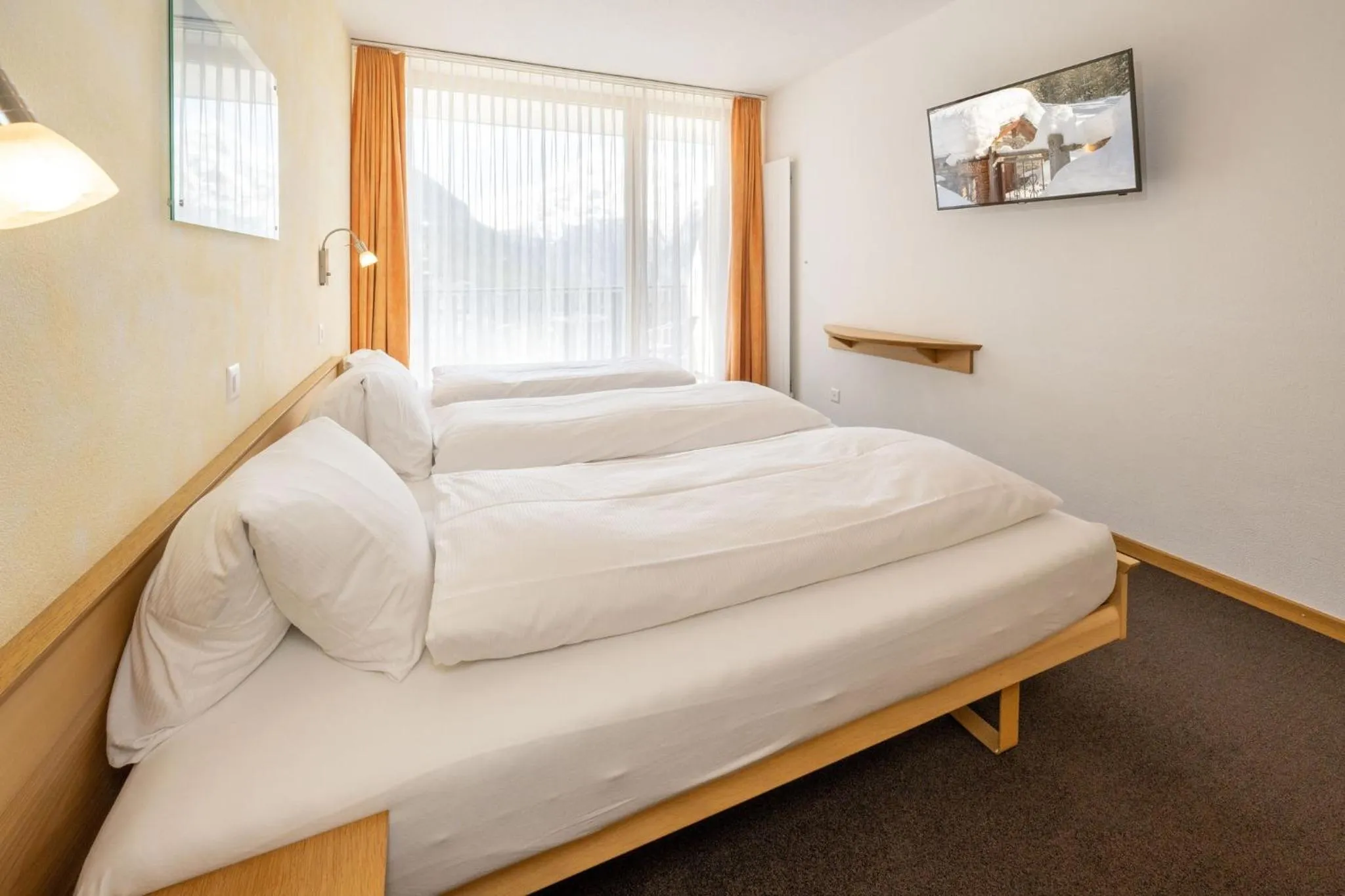 Photo of the whole room, Bed in Aktiv Hotel & Spa Hannigalp