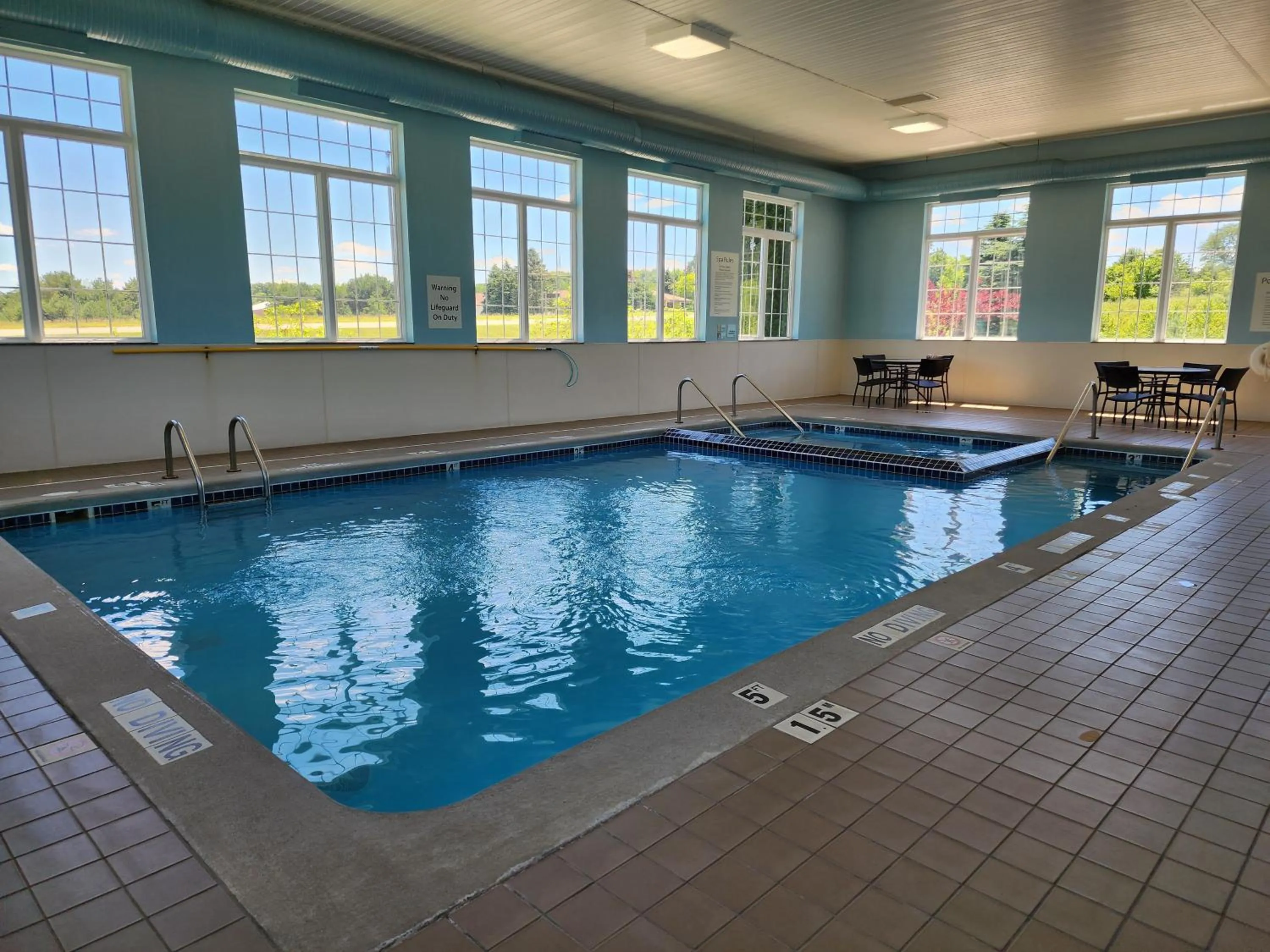 Swimming pool in Holiday Inn Express Hotel & Suites Cadillac by IHG