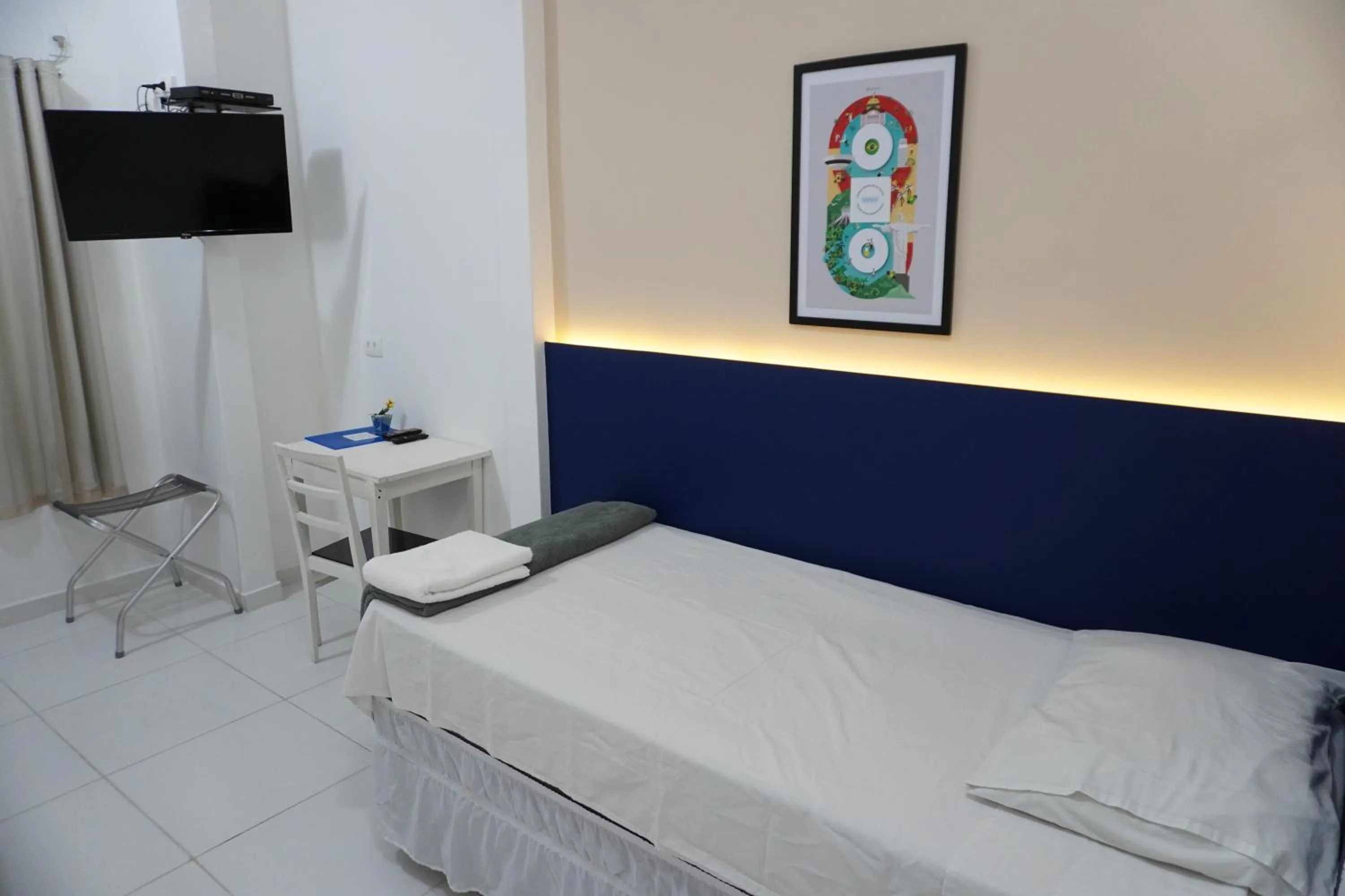 Bed in Copacabana Blue Hotel