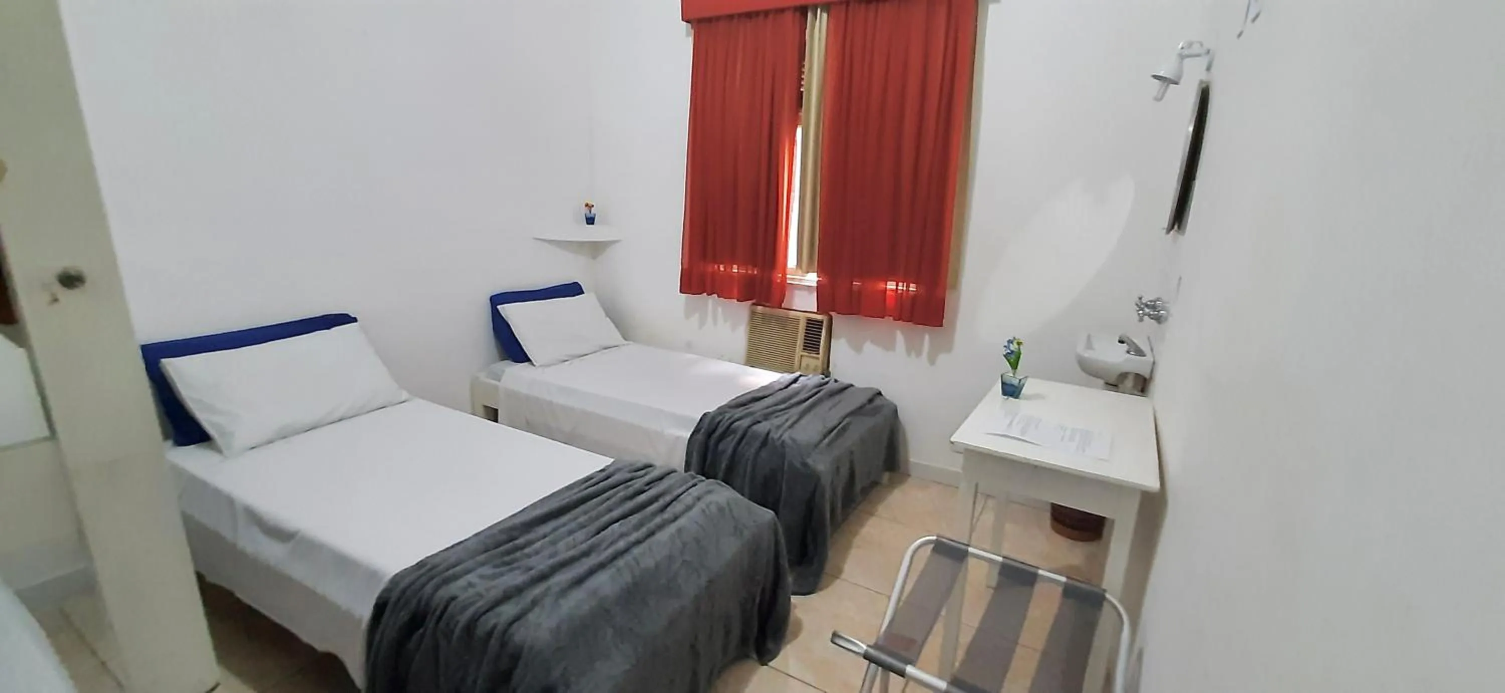 Bed in Copacabana Blue Hotel