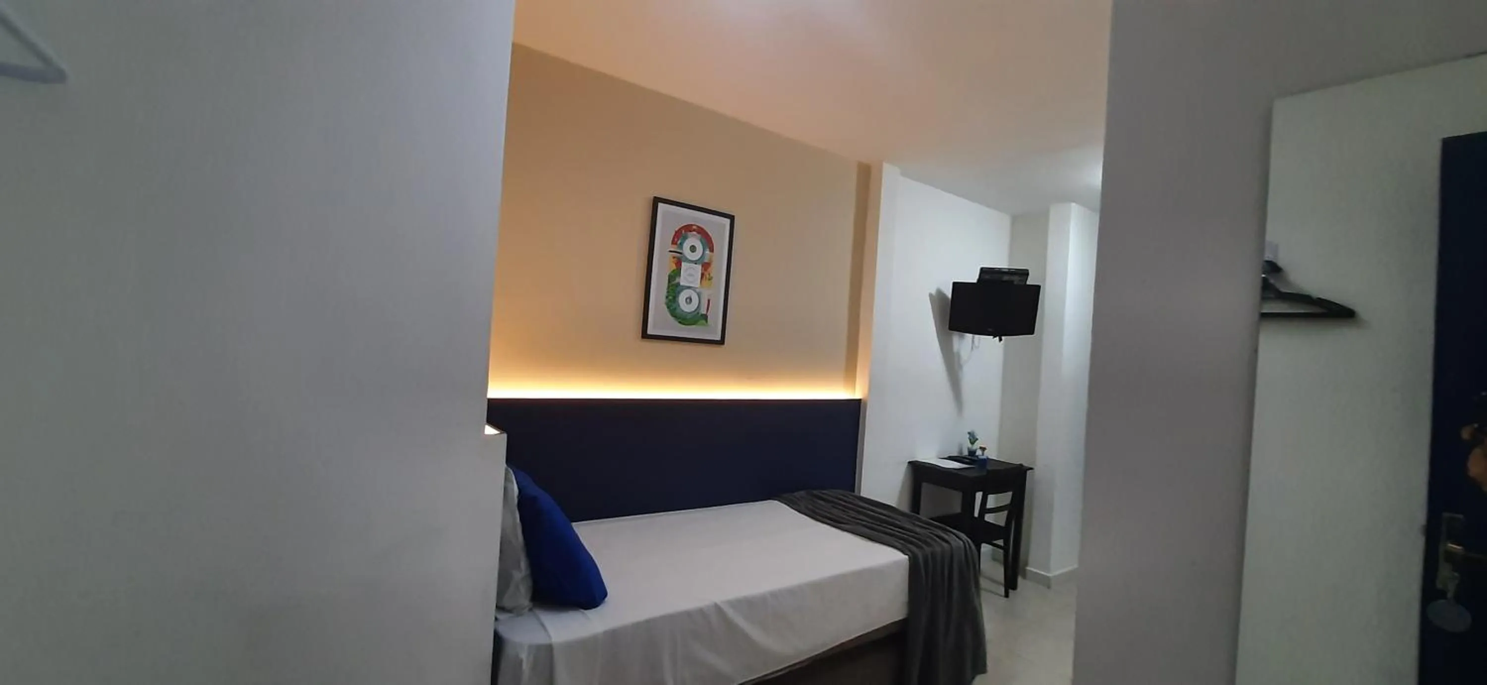 Bed in Copacabana Blue Hotel