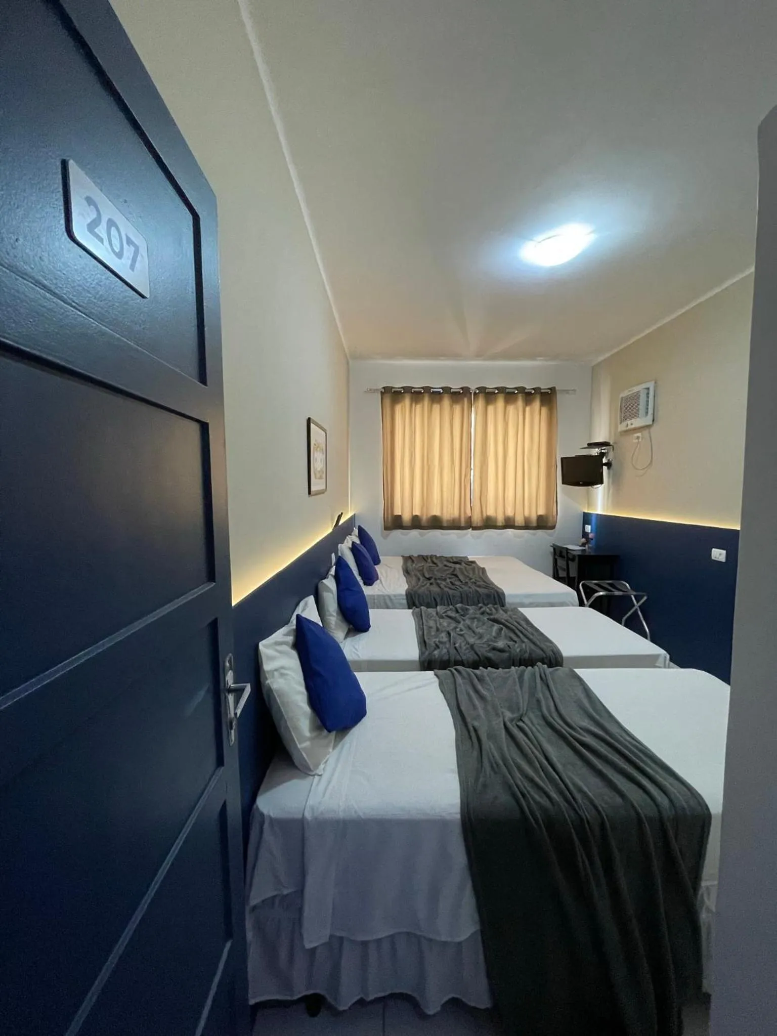 Bed in Copacabana Blue Hotel