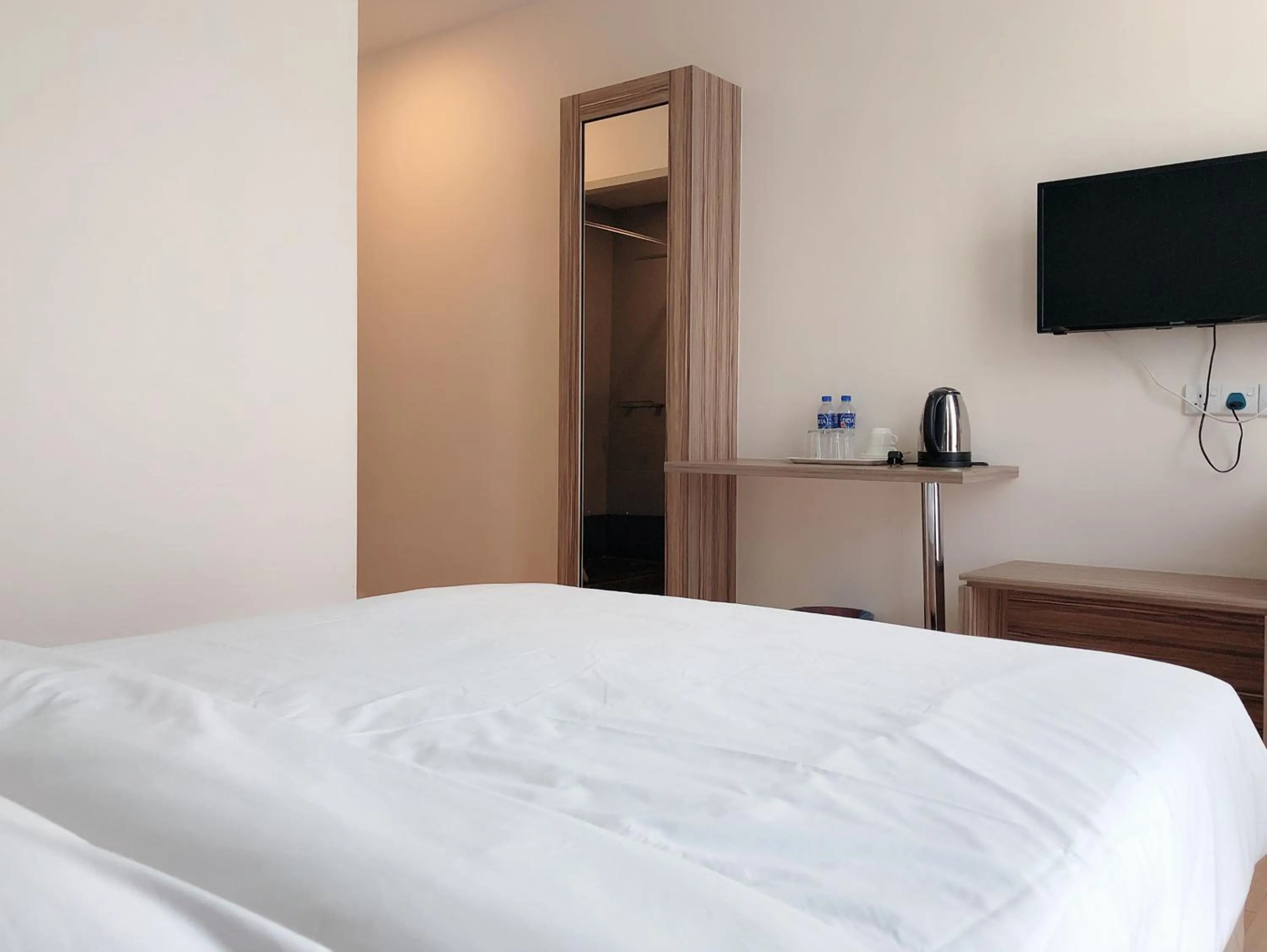 TV and multimedia, Bed in Tumike Hotel Bentong