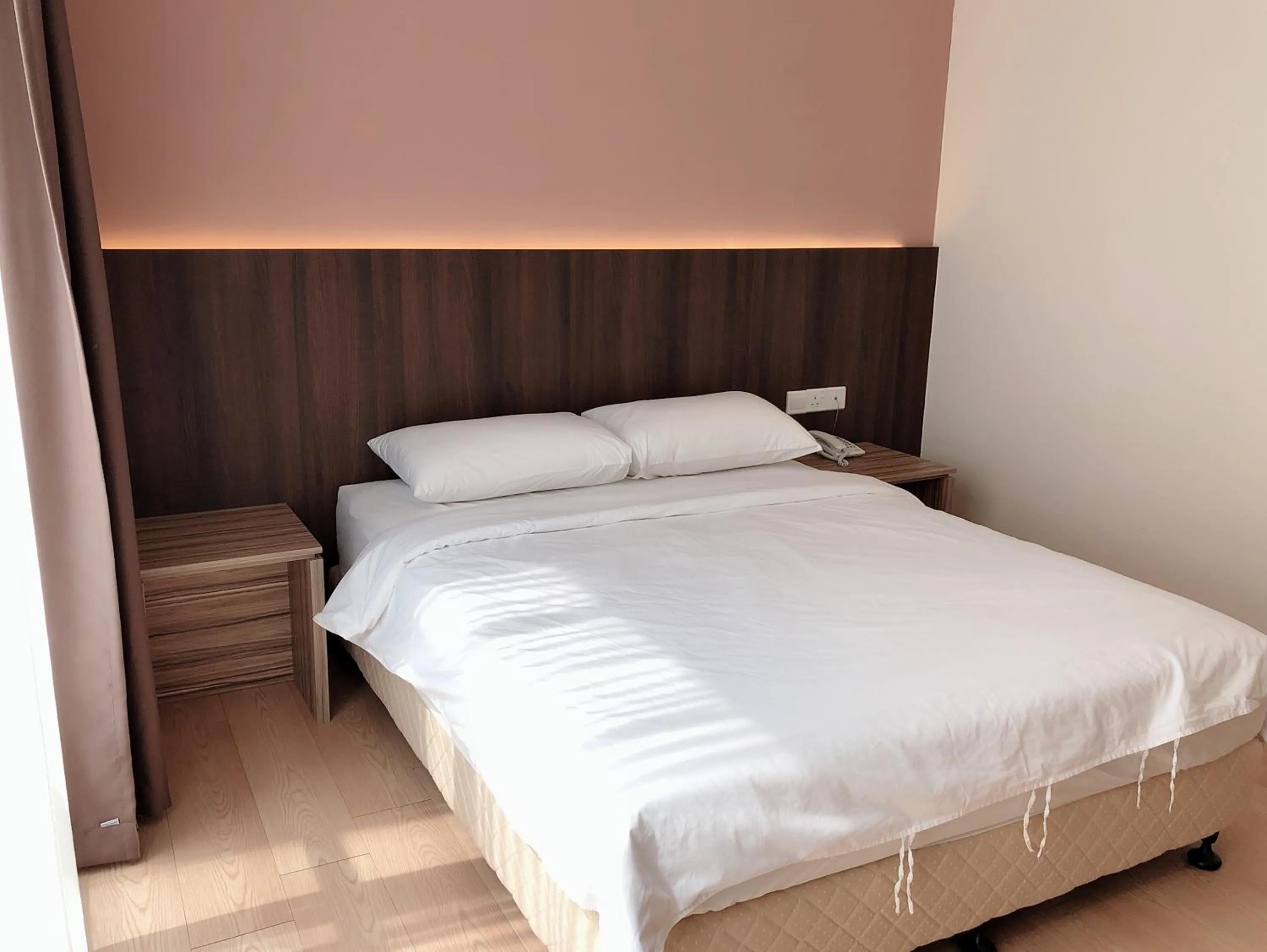 Bed in Tumike Hotel Bentong