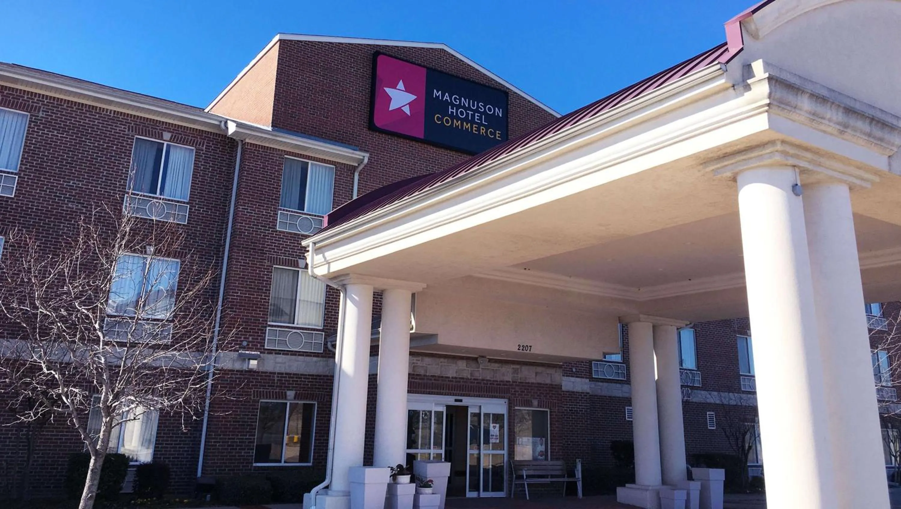 Property building in Magnuson Hotel Commerce