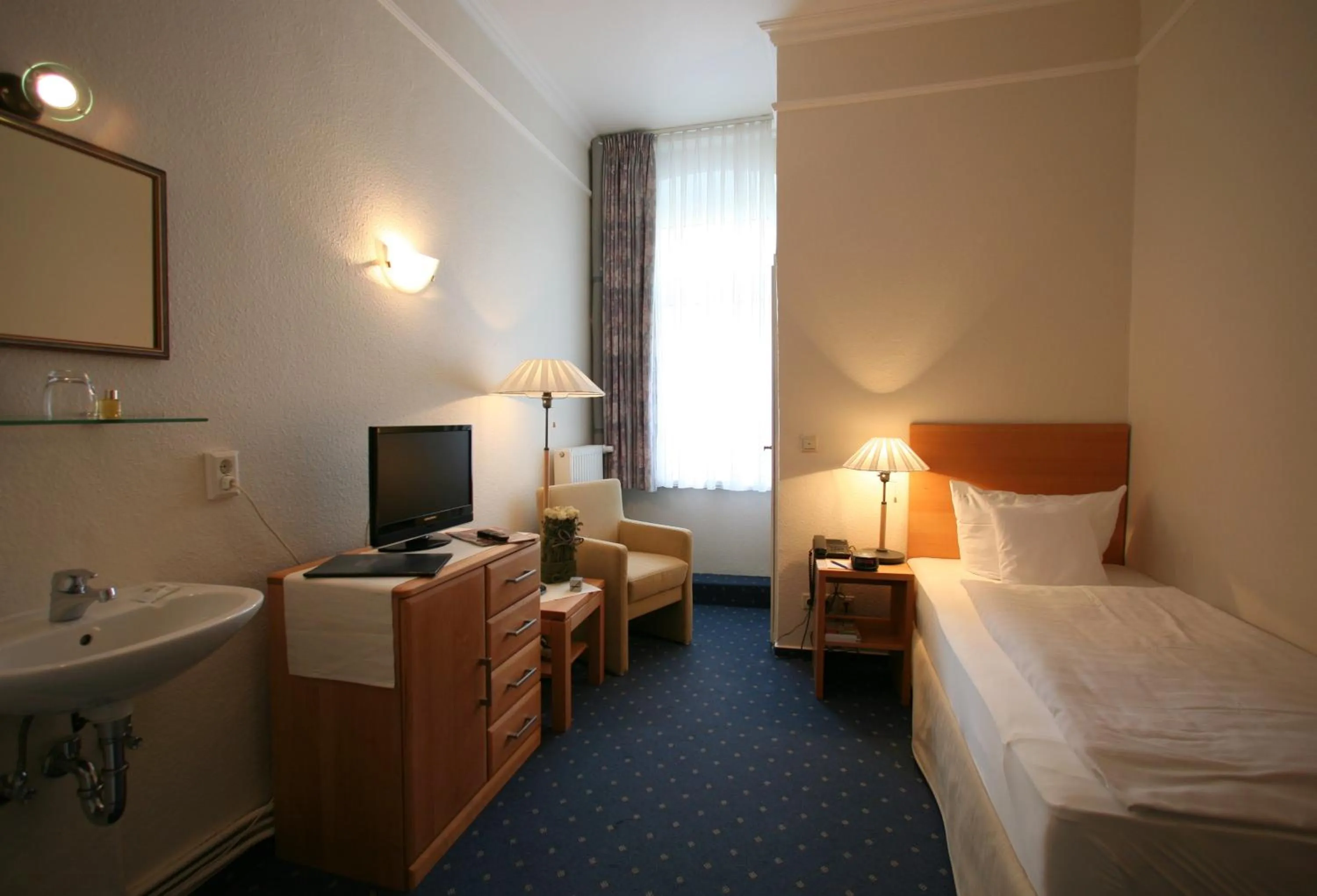 Bed in Hotel Gutenberg