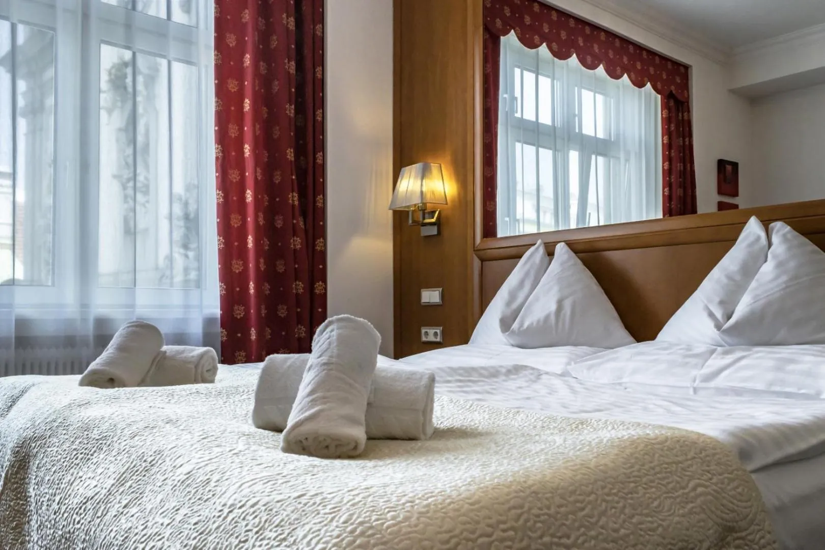 Bed in Hotel Corvinus Vienna