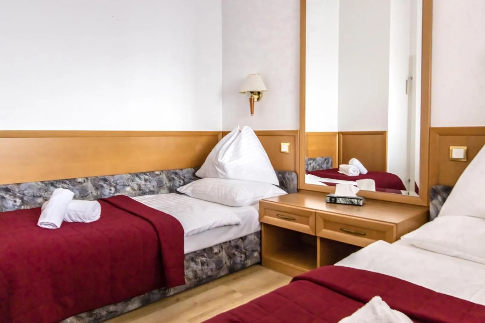 Bed in Hotel Corvinus Vienna