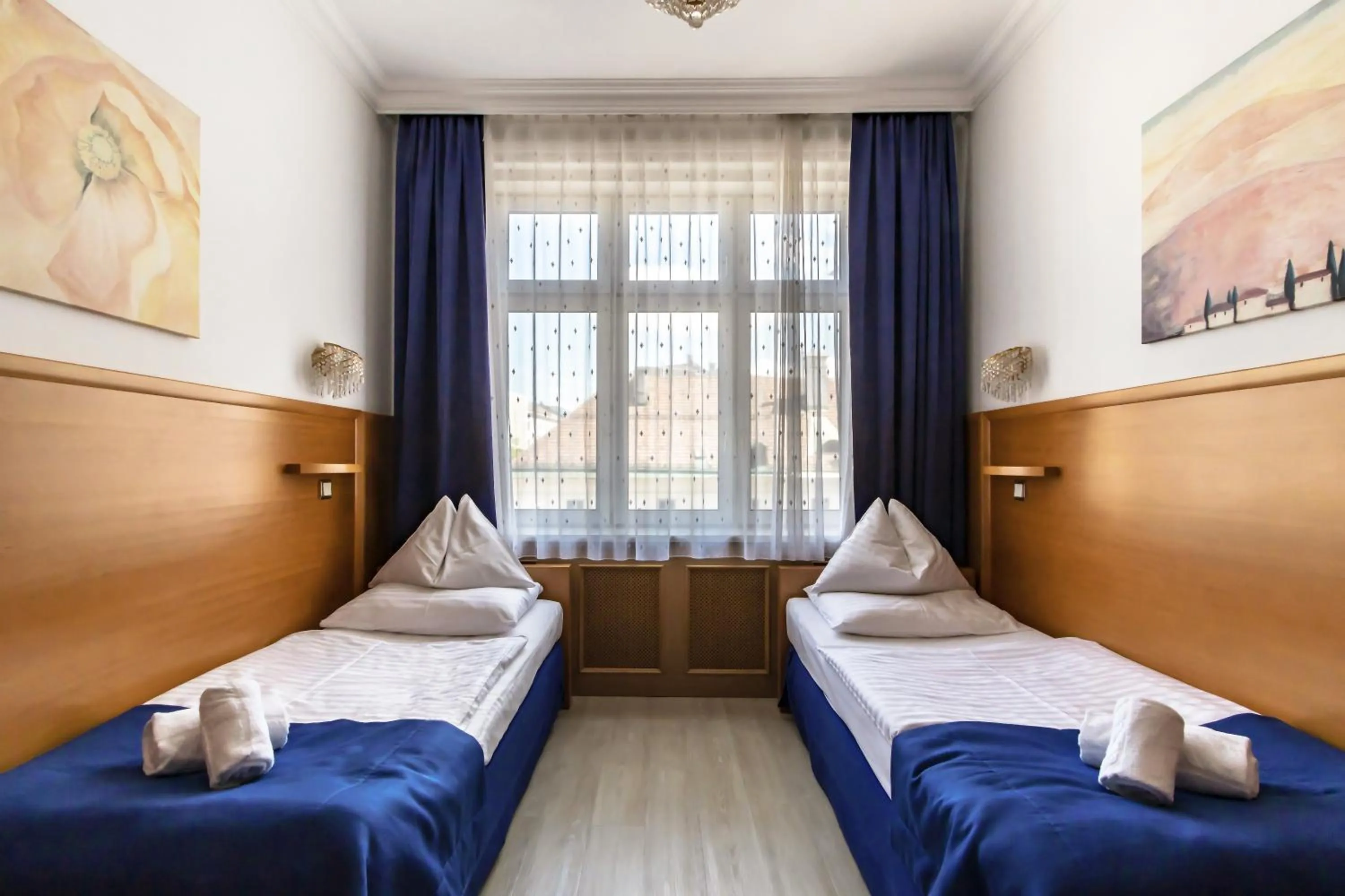 Bed in Hotel Corvinus Vienna