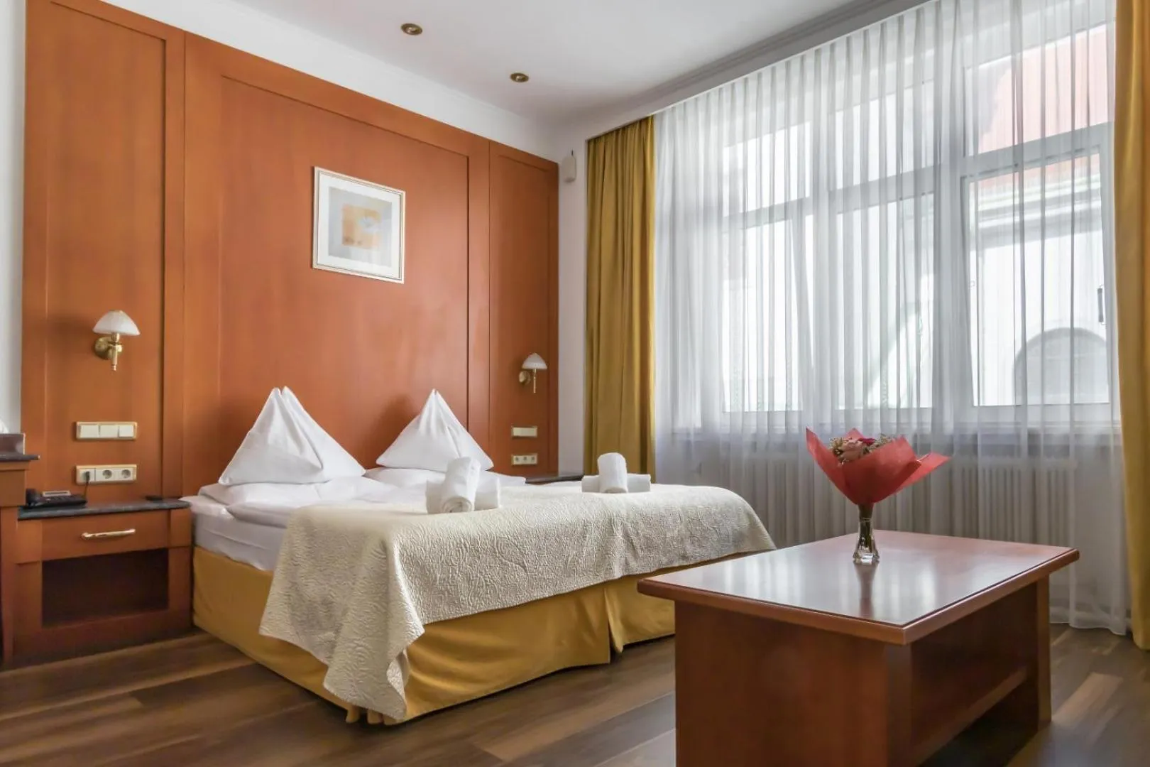 Bed in Hotel Corvinus Vienna