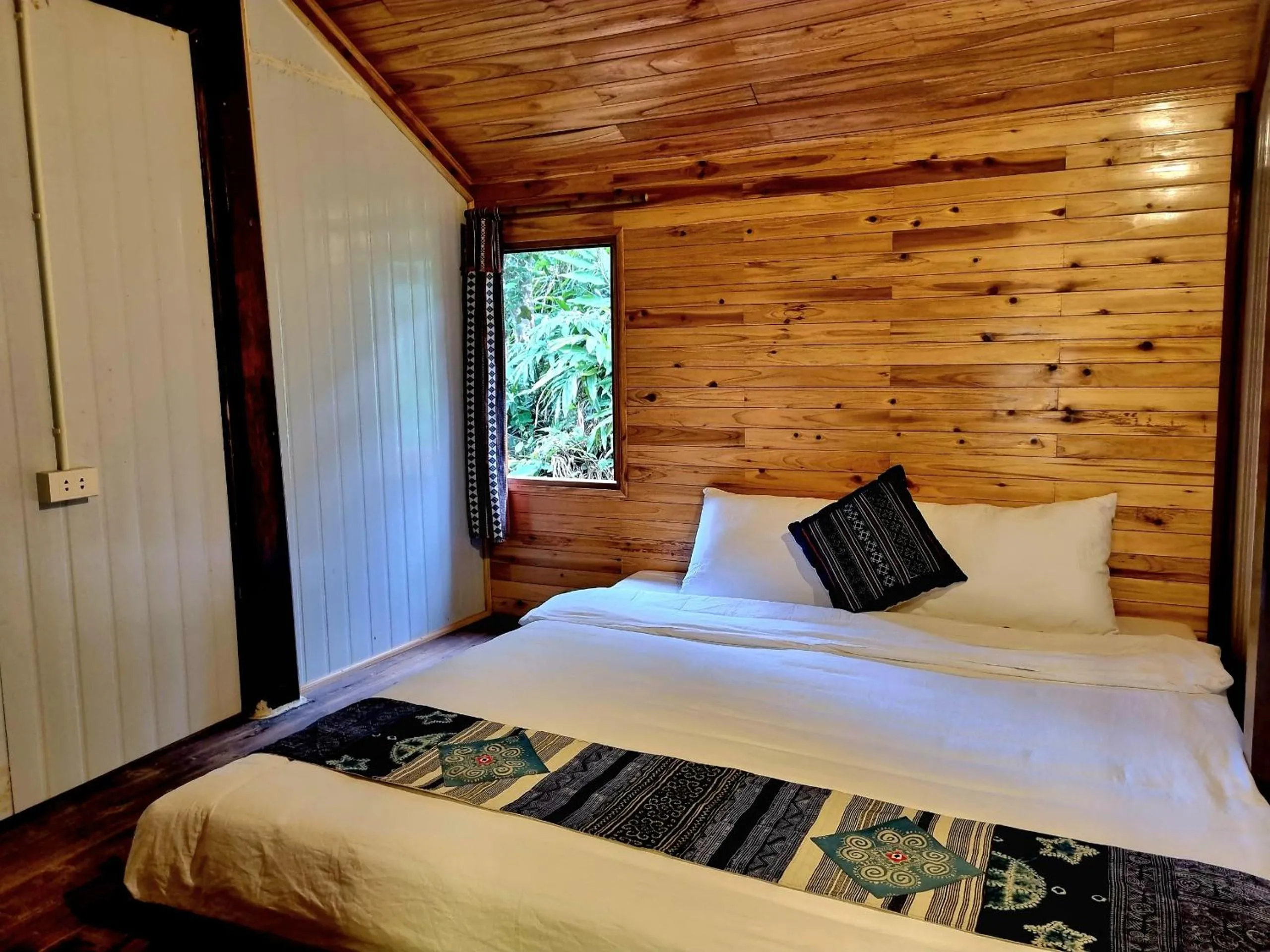Bed in Tavan Chopai Homestay