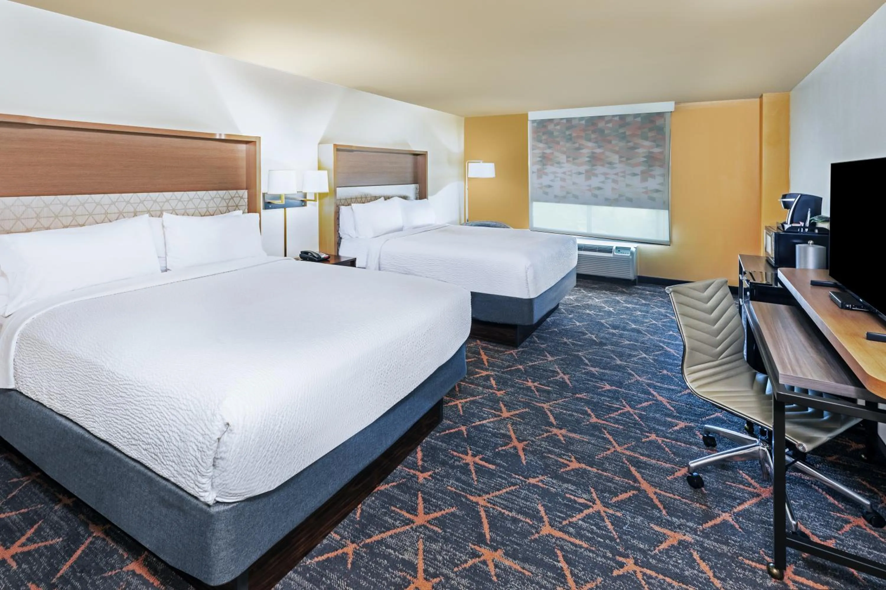 Bedroom, Bed in Holiday Inn Hotel & Suites Tulsa South by IHG