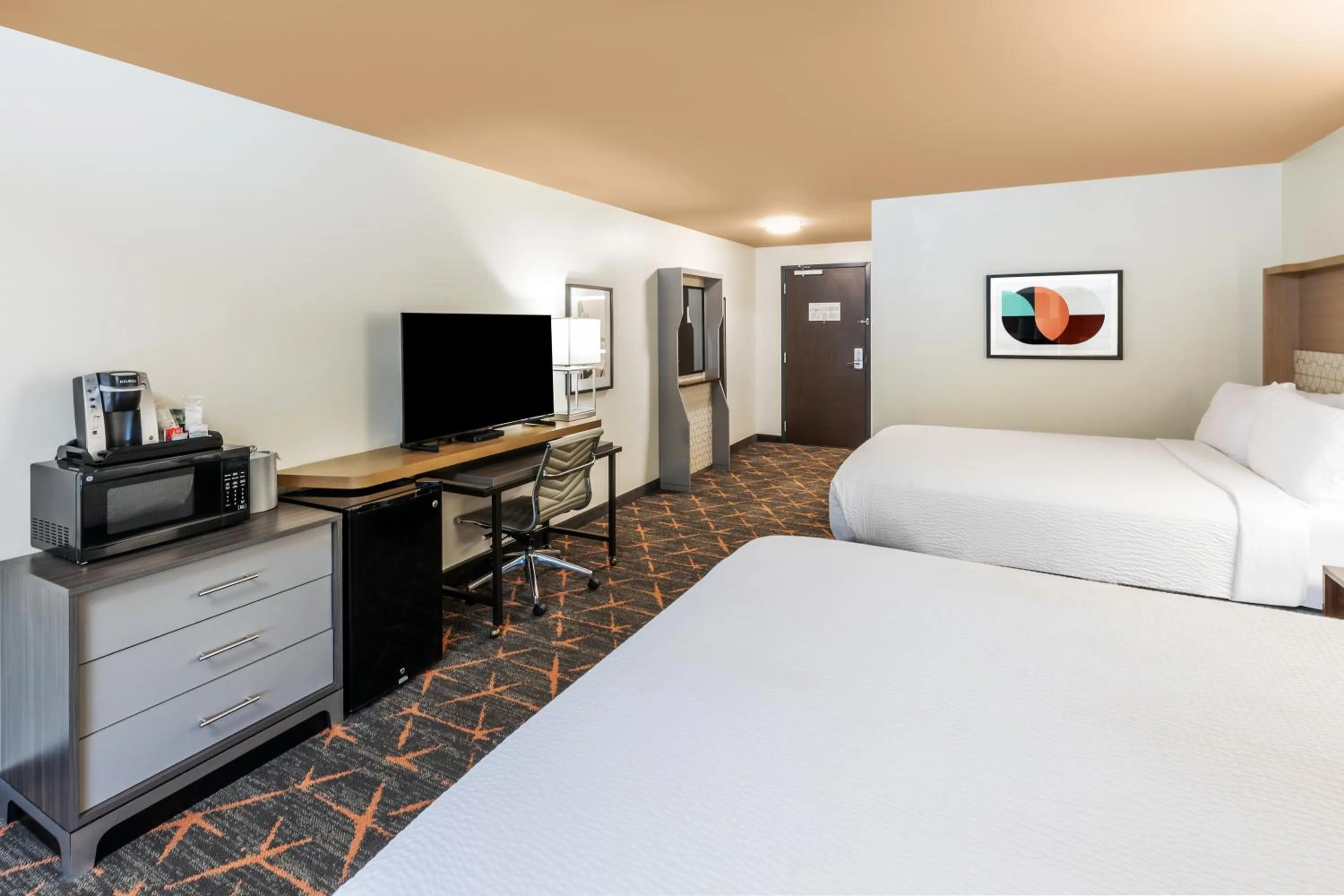 Bed in Holiday Inn Hotel & Suites Tulsa South by IHG
