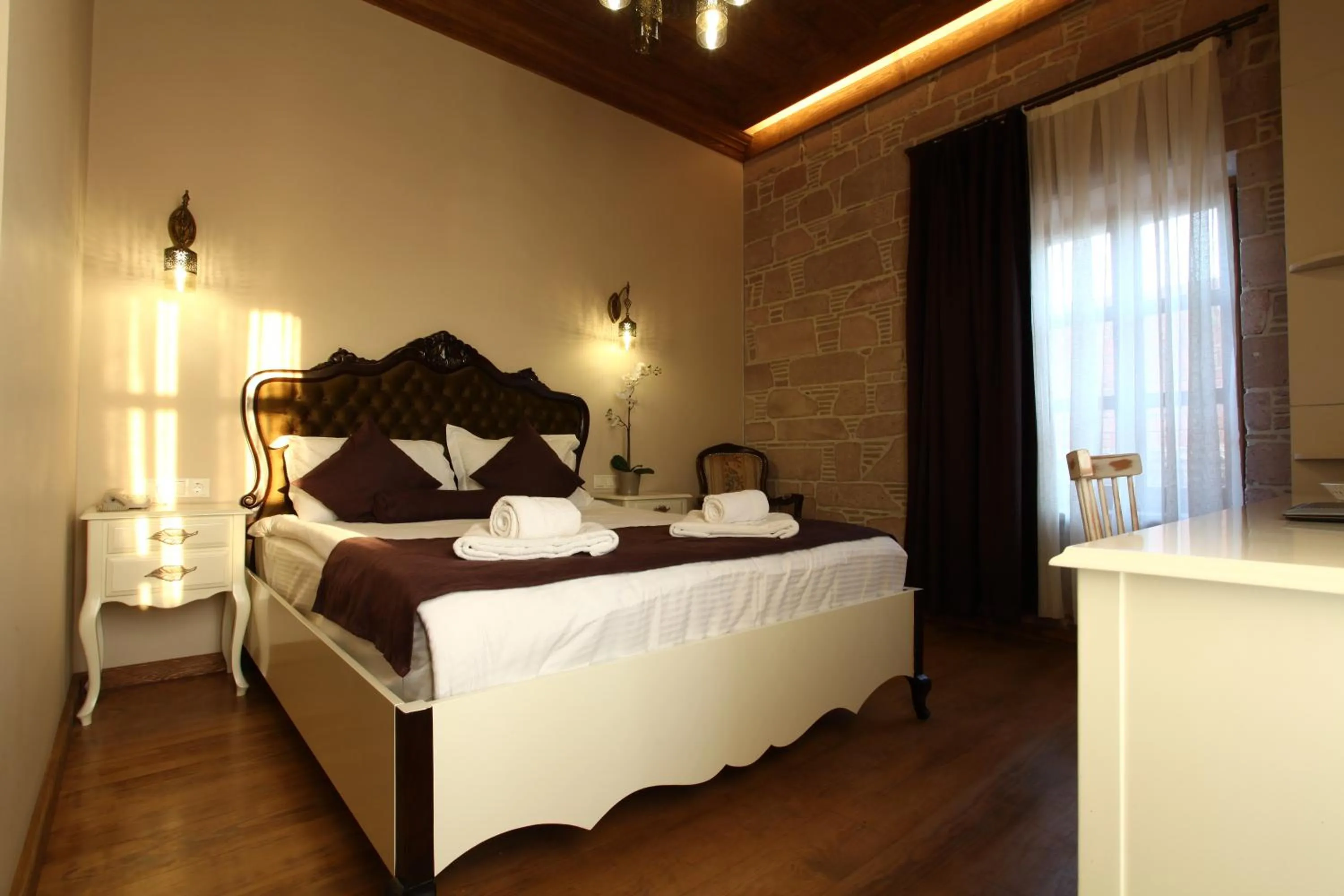 Decorative detail, Bed in Orchis Hotel