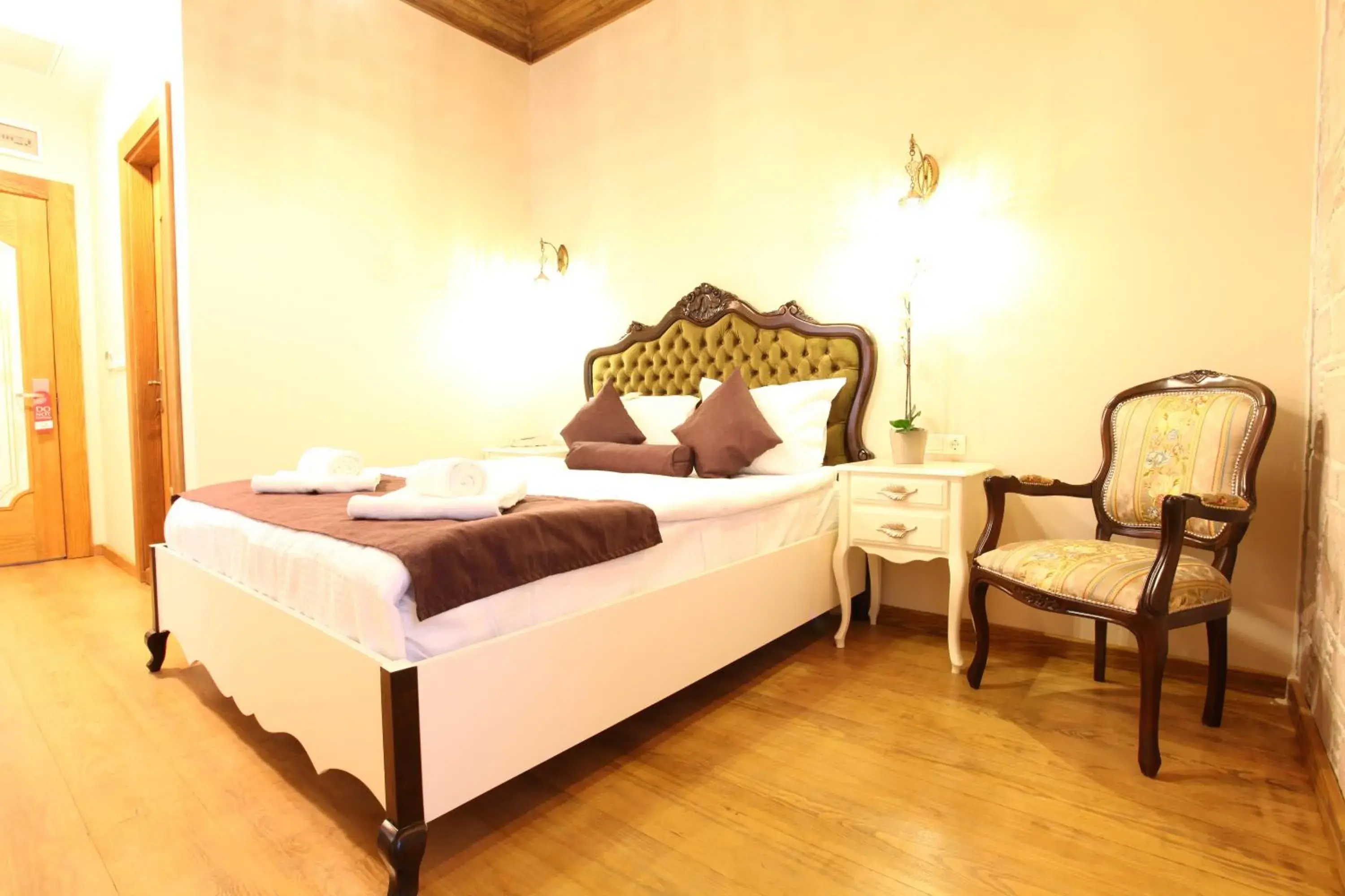 Decorative detail, Bed in Orchis Hotel Decorative detail, Bed in Orchis Hotel