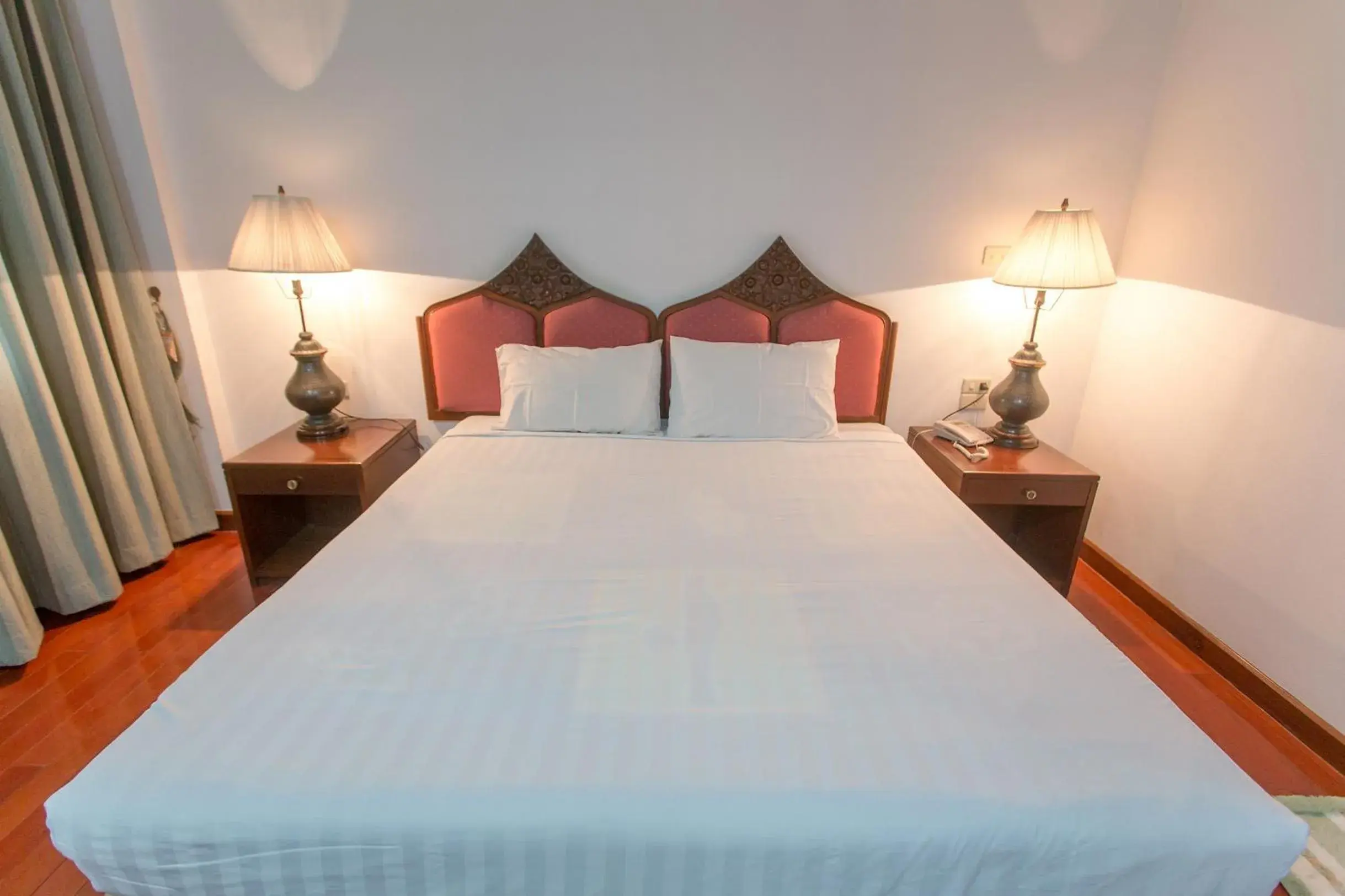 Bed in Tangerine Ville Hotel Bed in Tangerine Ville Hotel