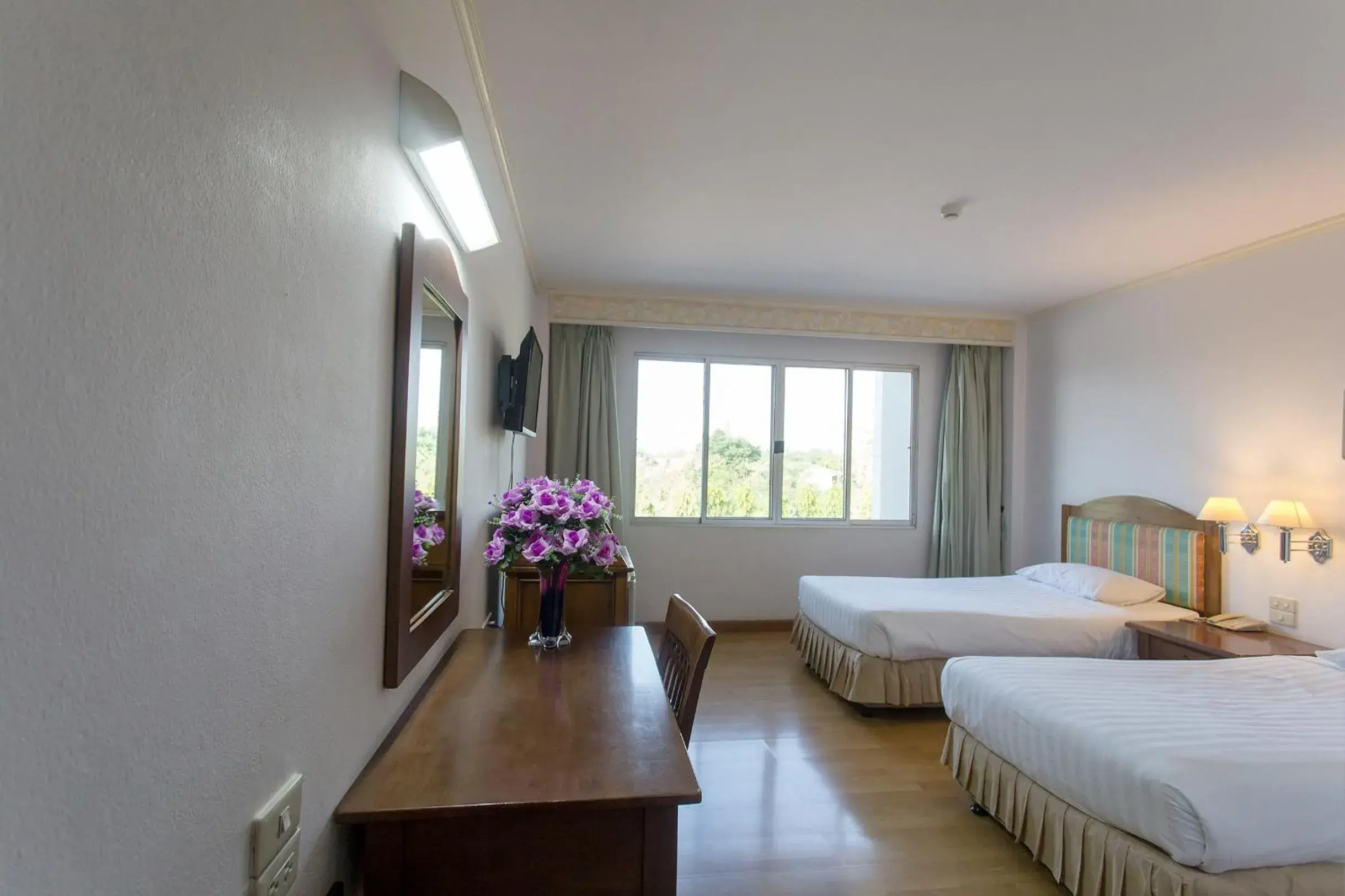 Bed in Tangerine Ville Hotel Bed in Tangerine Ville Hotel