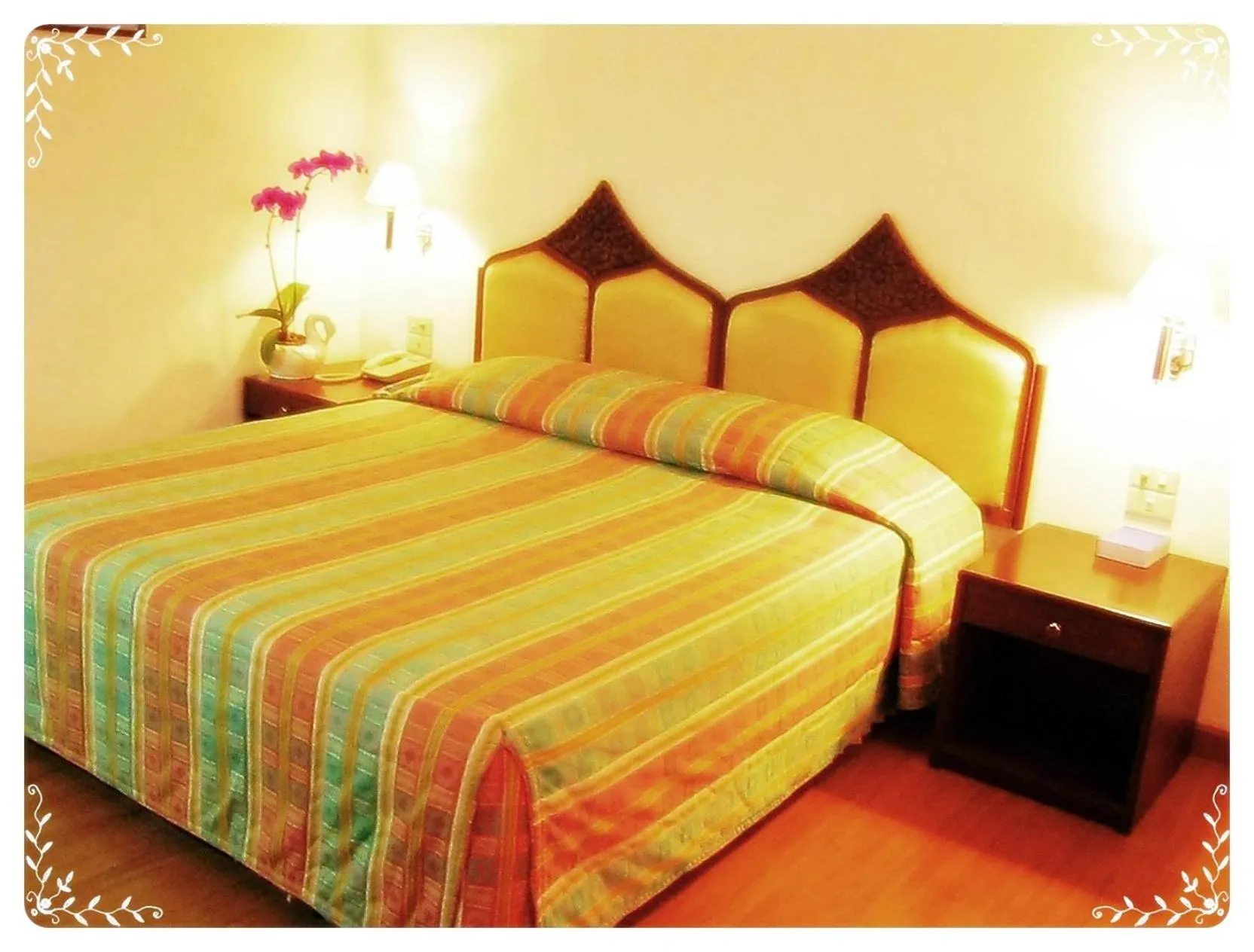 Communal lounge/ TV room, Bed in Tangerine Ville Hotel