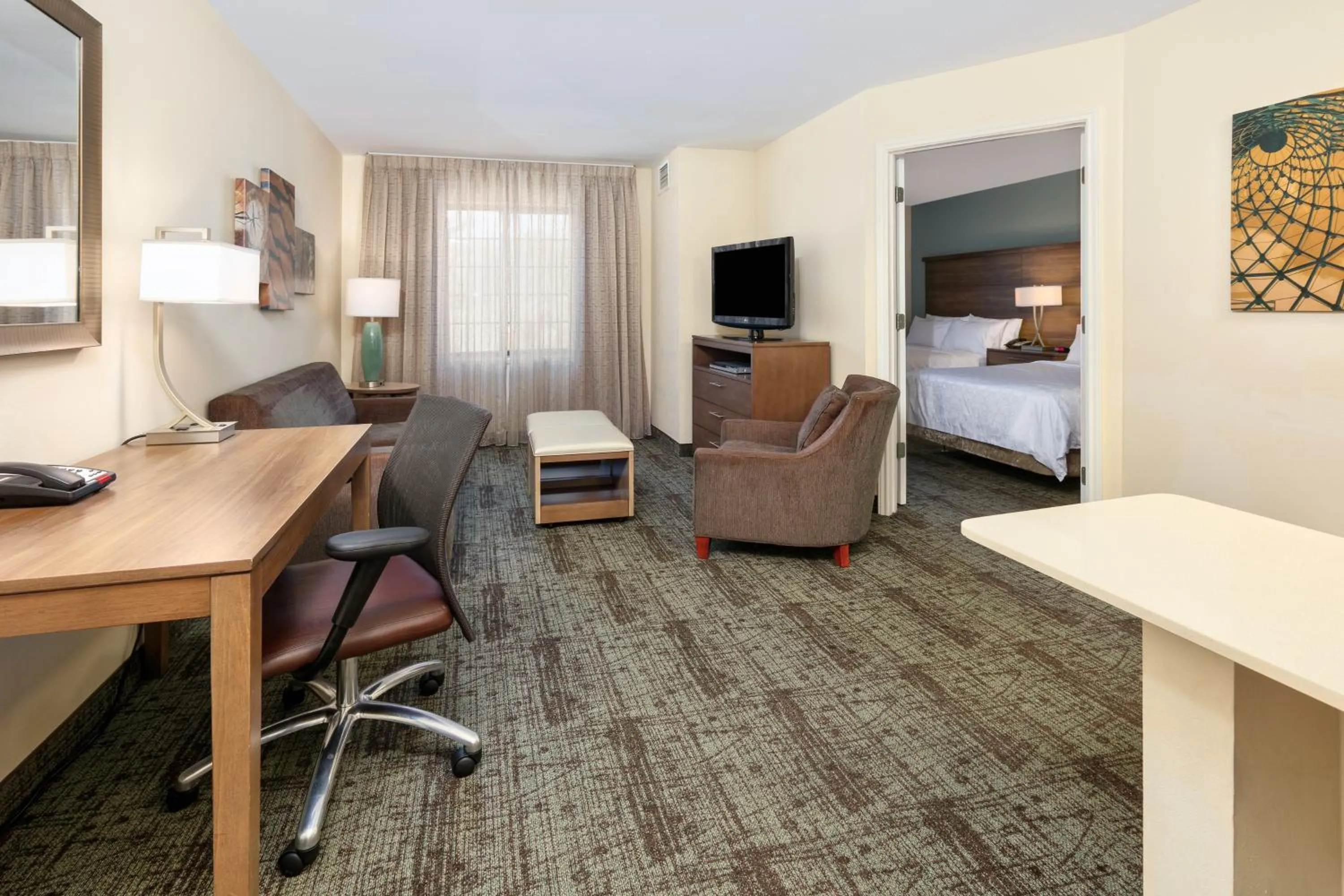 Photo of the whole room, Bed in Staybridge Suites Corning by IHG