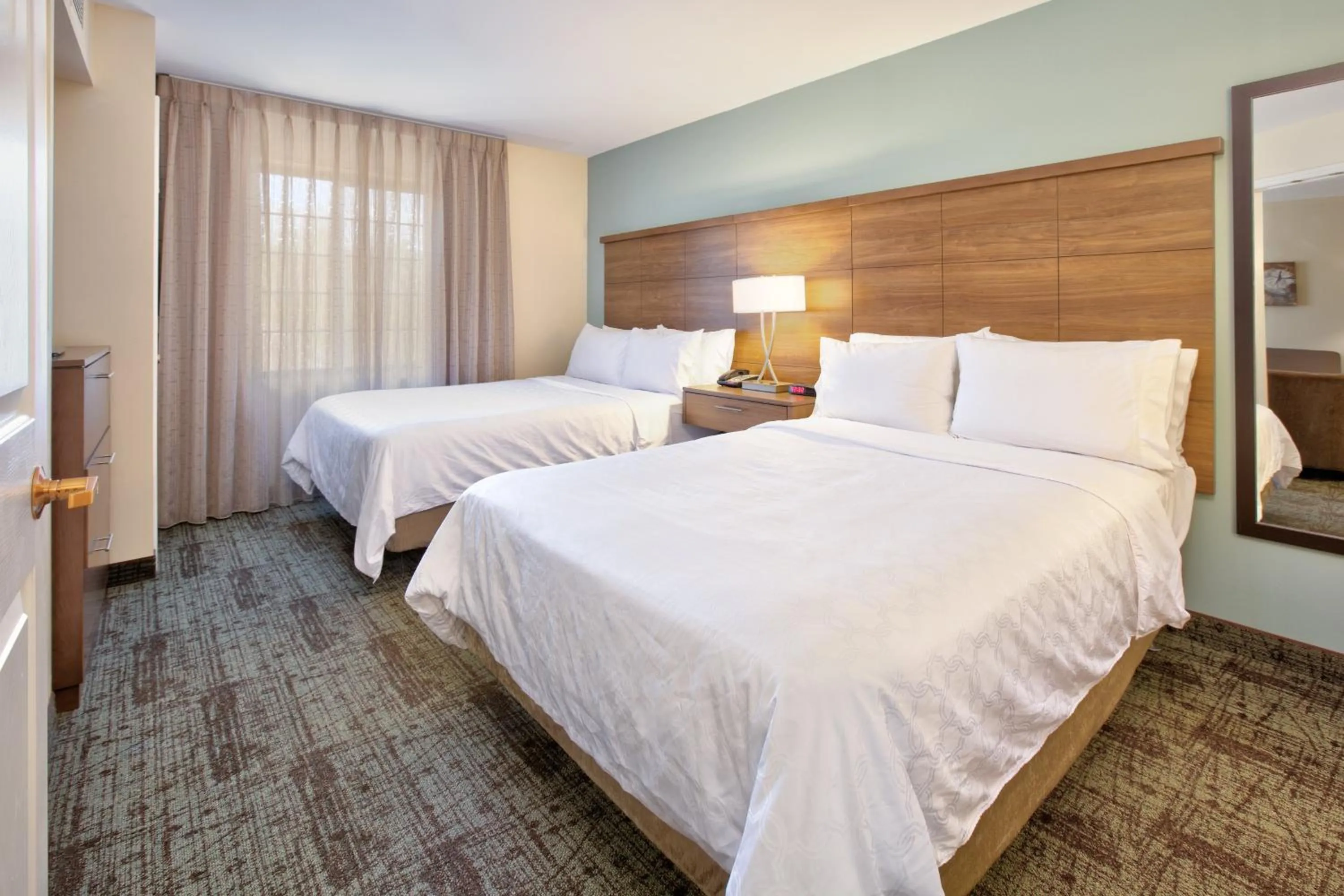 Photo of the whole room, Bed in Staybridge Suites Corning by IHG