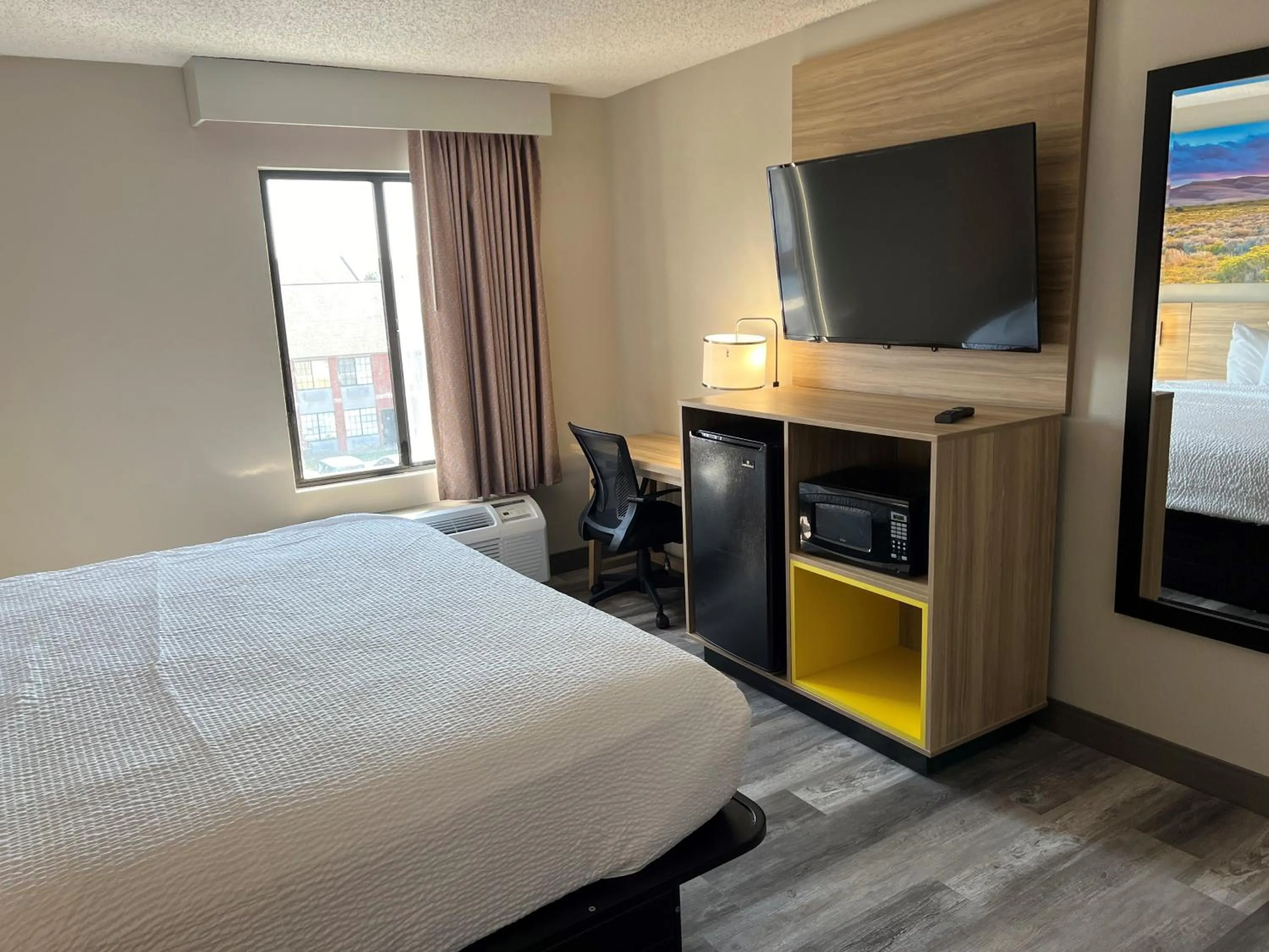 Bed in Days Inn by Wyndham Tulsa Central