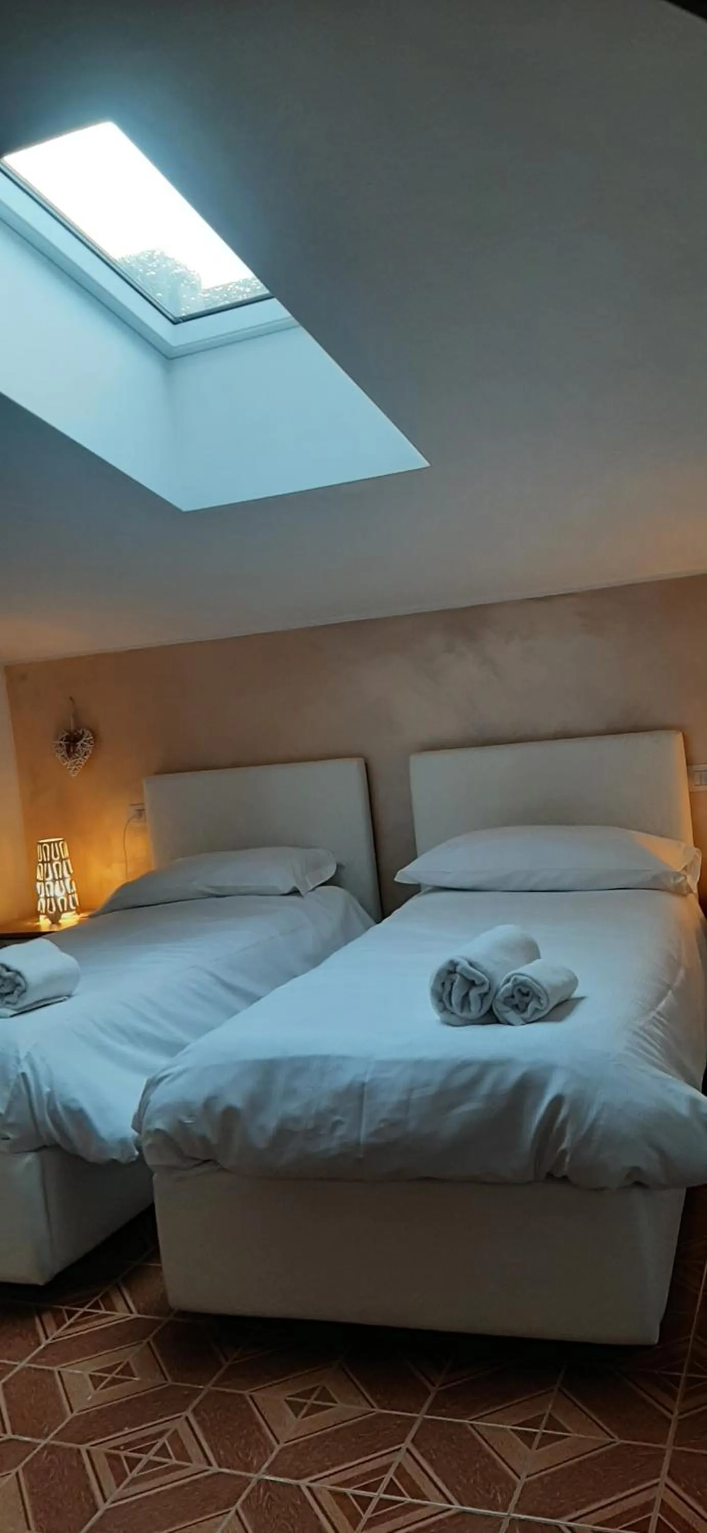 Bedroom in Camere Porto Vecchio con parcheggio a pochi passi dal castello