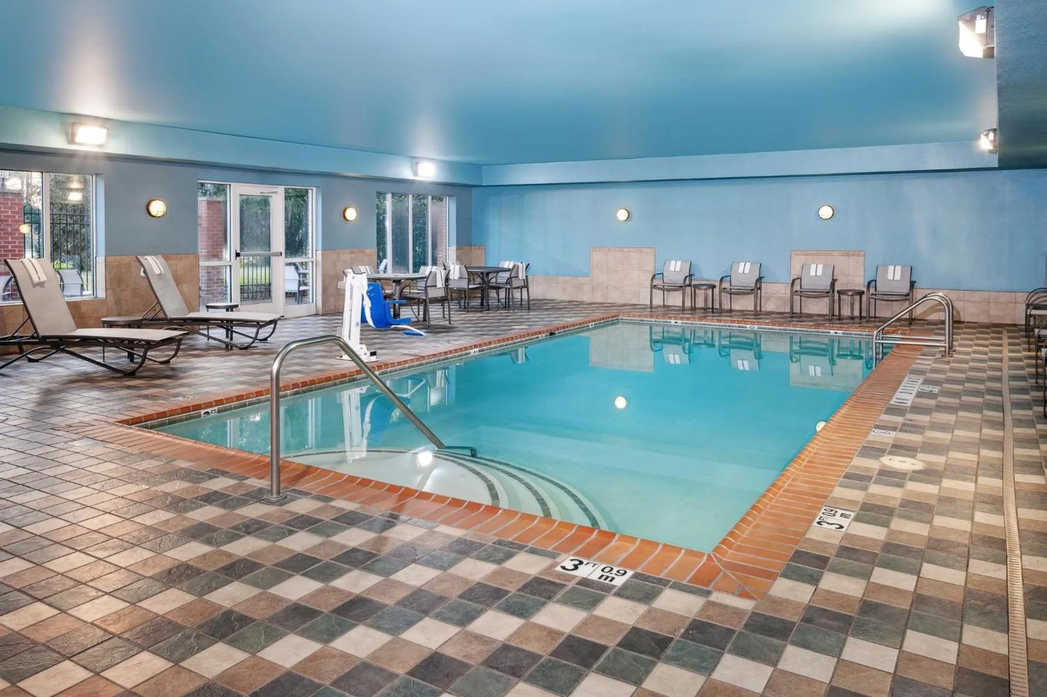 Swimming pool in Holiday Inn Express Hotel & Suites Urbana-Champaign-U of I Area by IHG