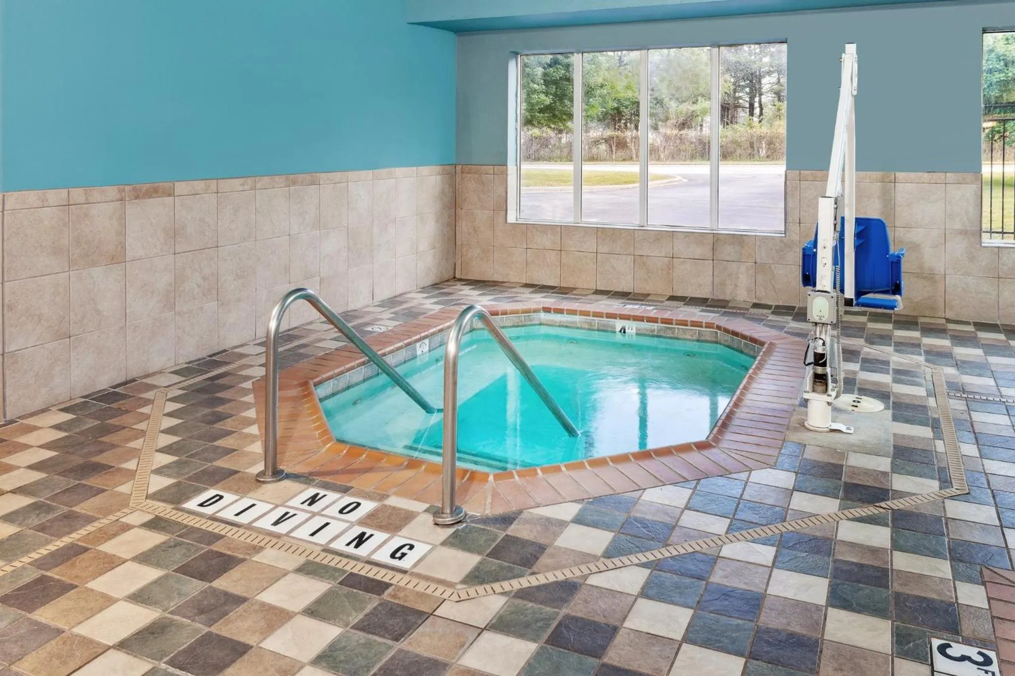 Swimming pool in Holiday Inn Express Hotel & Suites Urbana-Champaign-U of I Area by IHG