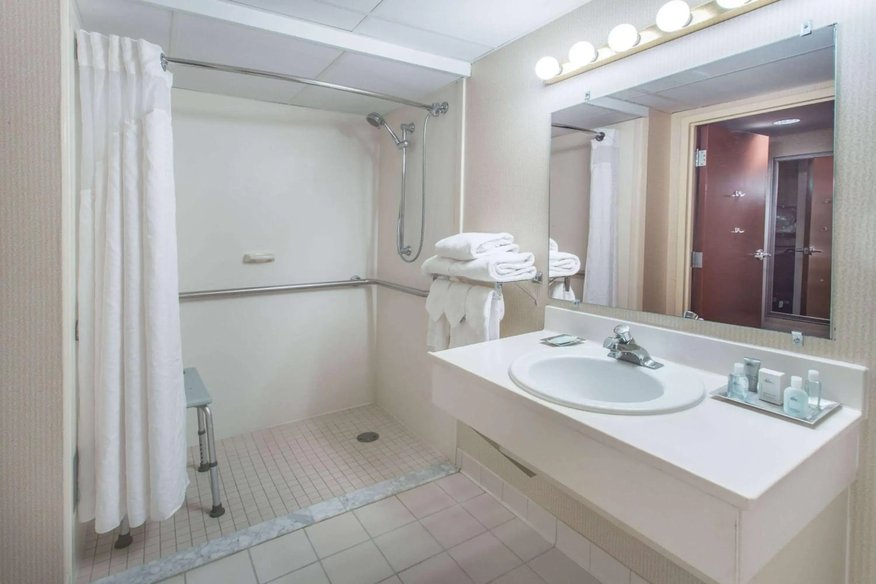 Bathroom in Wyndham Garden Conference Center Champaign - Urbana Bathroom in Wyndham Garden Conference Center Champaign - Urbana