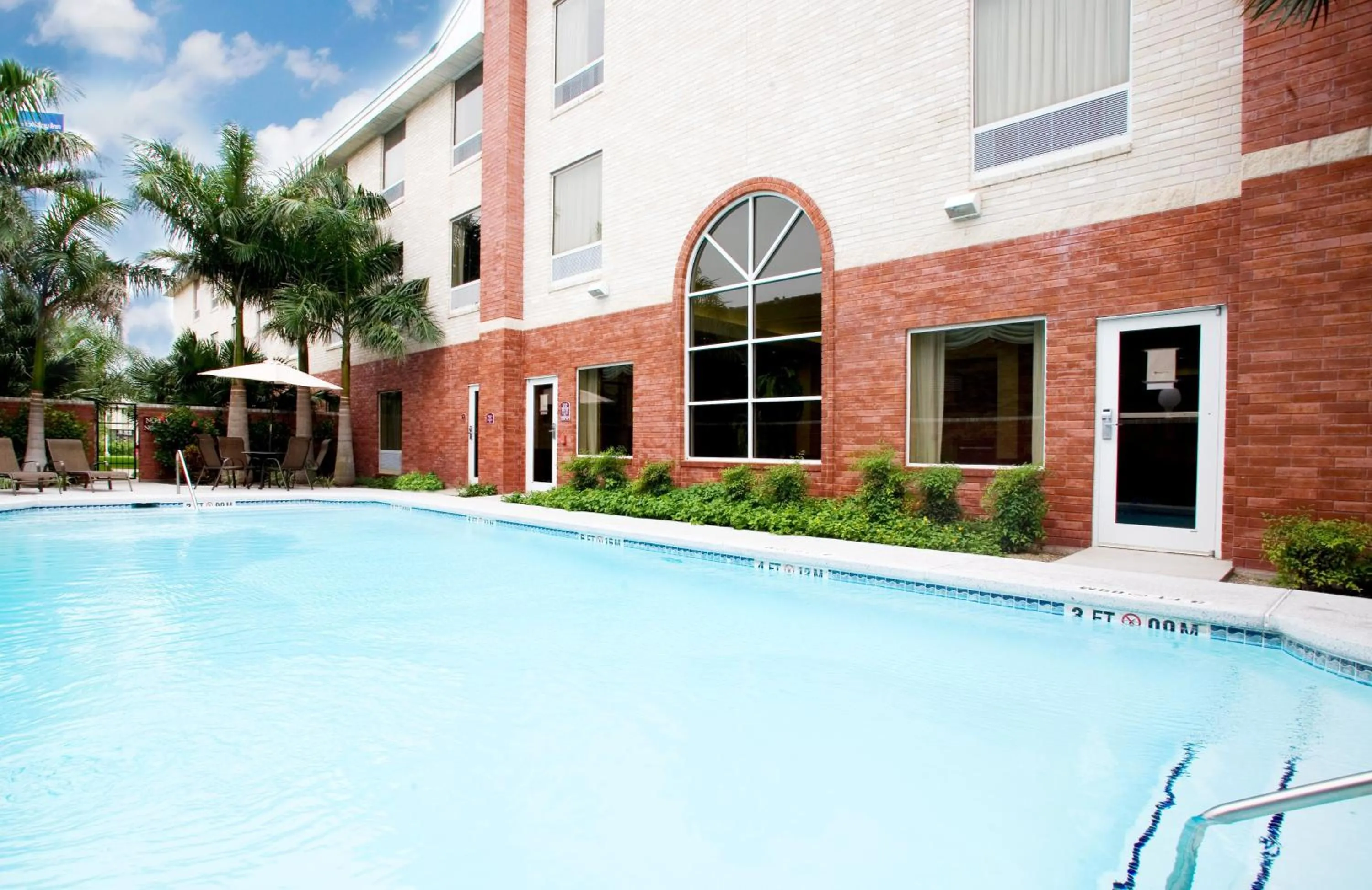 Swimming pool in Holiday Inn Express Hotel and Suites Weslaco by IHG