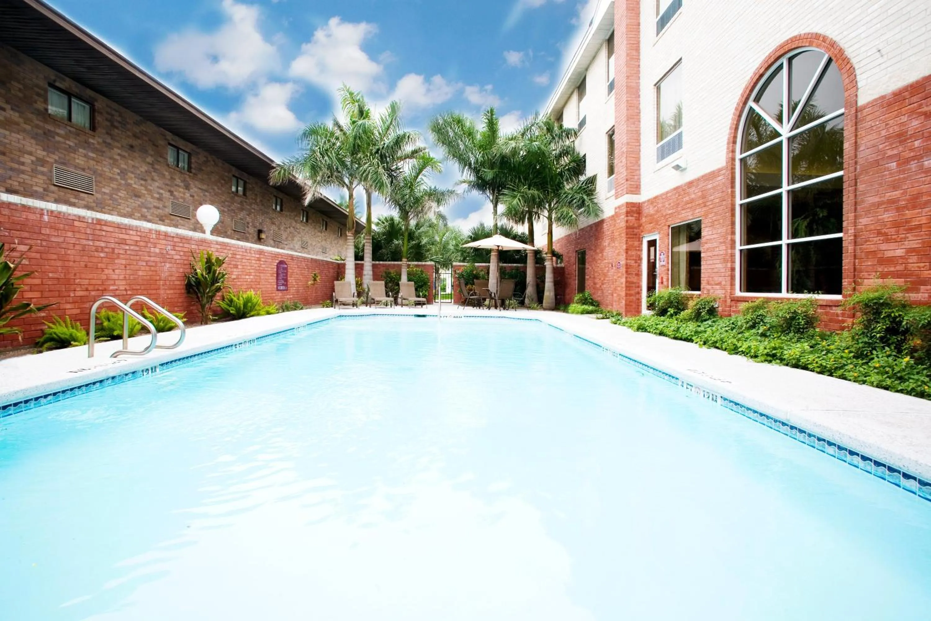 Swimming pool in Holiday Inn Express Hotel and Suites Weslaco by IHG