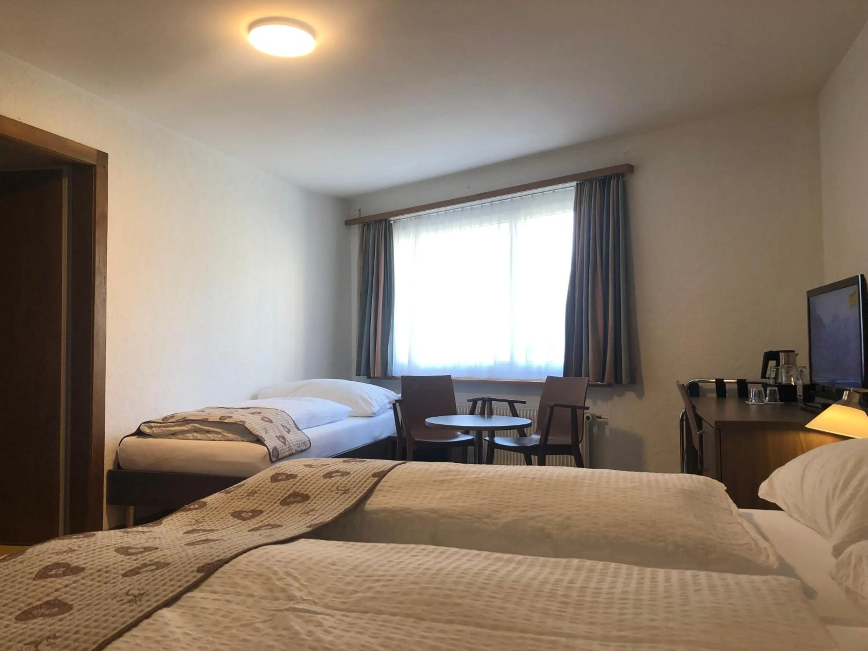 Photo of the whole room, Bed in Hotel Crystal Interlaken