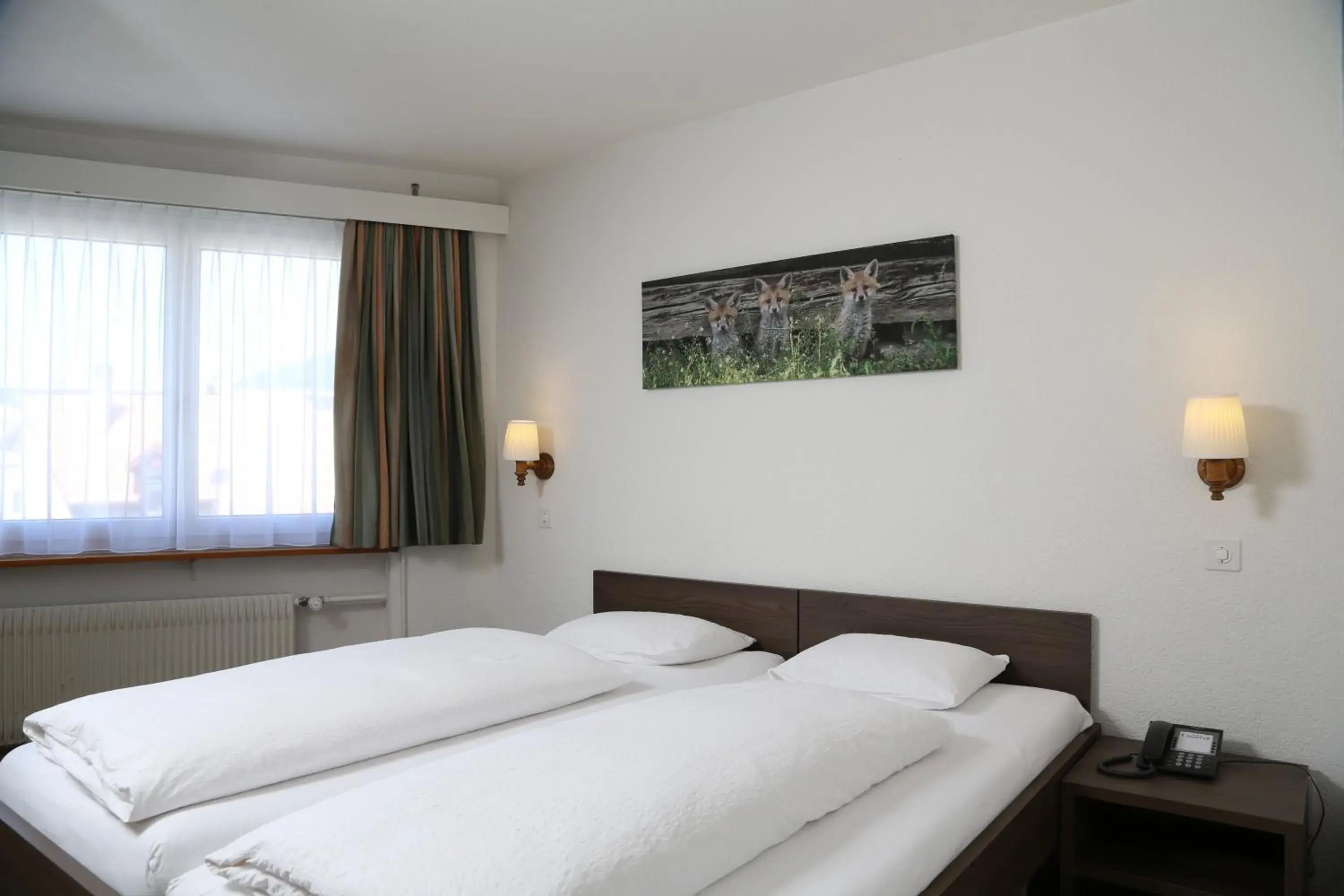 Standard Twin Room with A/C (16 - 18m2) in Hotel Crystal Interlaken Standard Twin Room with A/C (16 - 18m2) in Hotel Crystal Interlaken