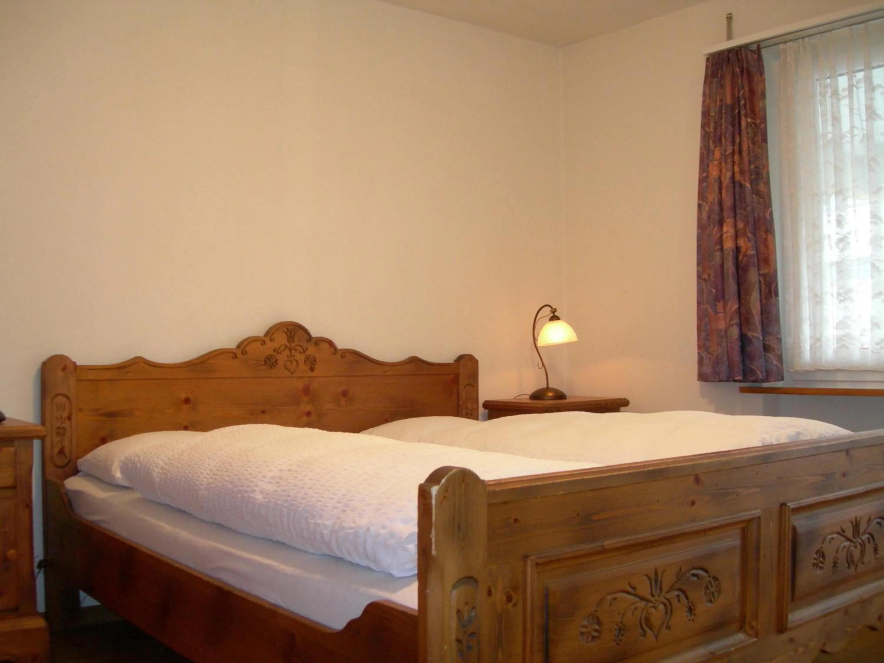 Bed in Hotel Crystal Interlaken