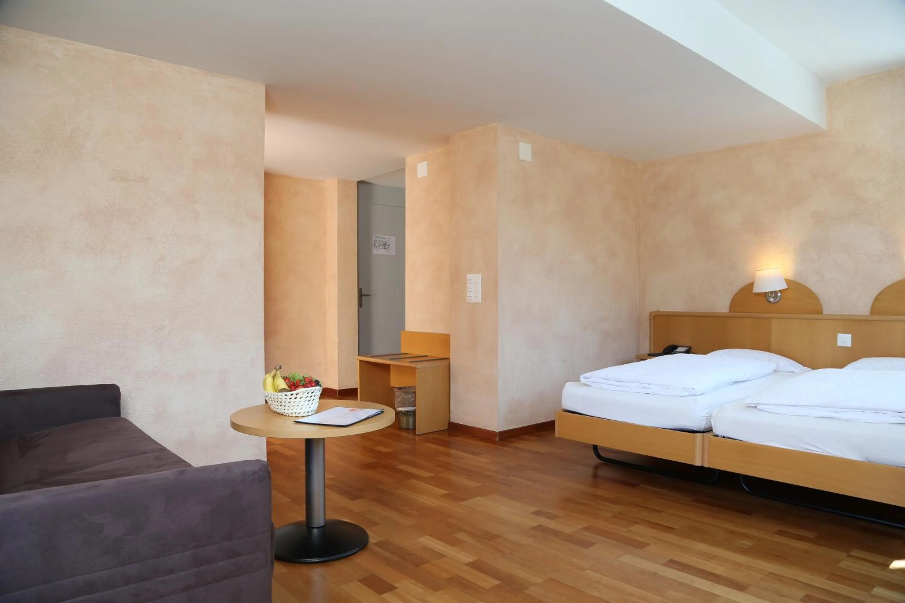 Photo of the whole room, Bed in Hotel Crystal Interlaken