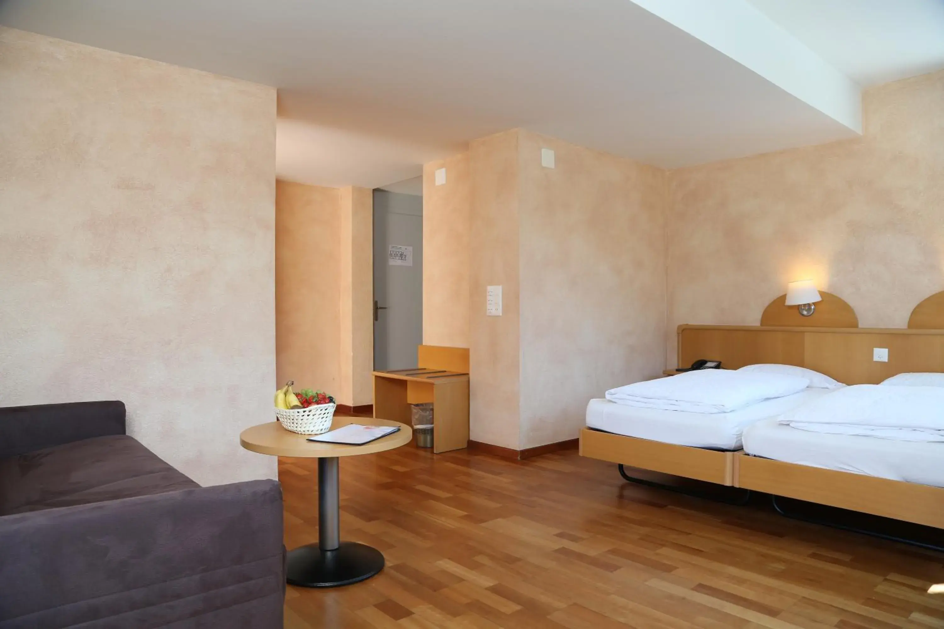 Deluxe Quadruple Room with A/C and Roof Terrace in Hotel Crystal Interlaken Deluxe Quadruple Room with A/C and Roof Terrace in Hotel Crystal Interlaken