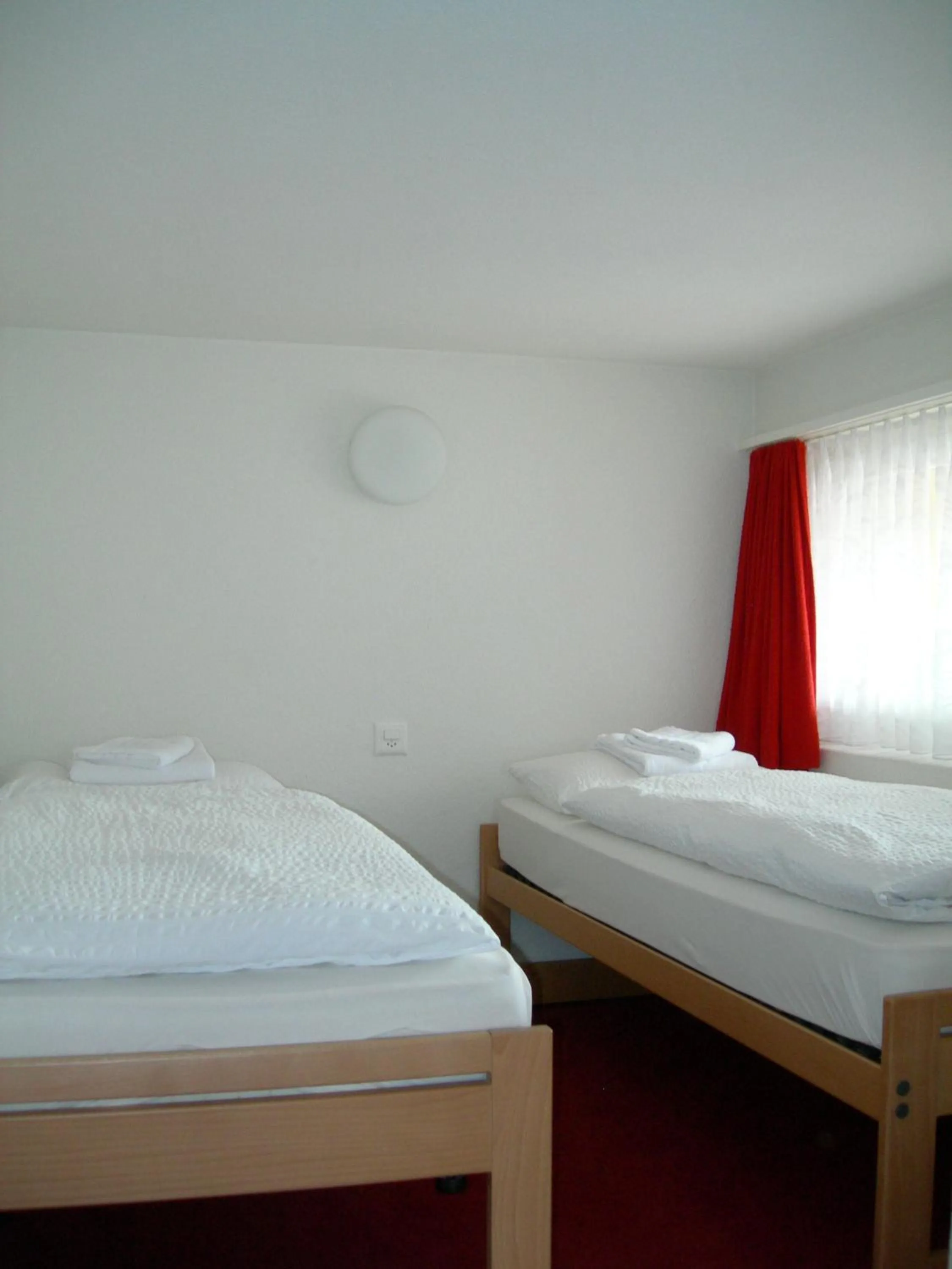 Bed in Hotel Crystal Interlaken