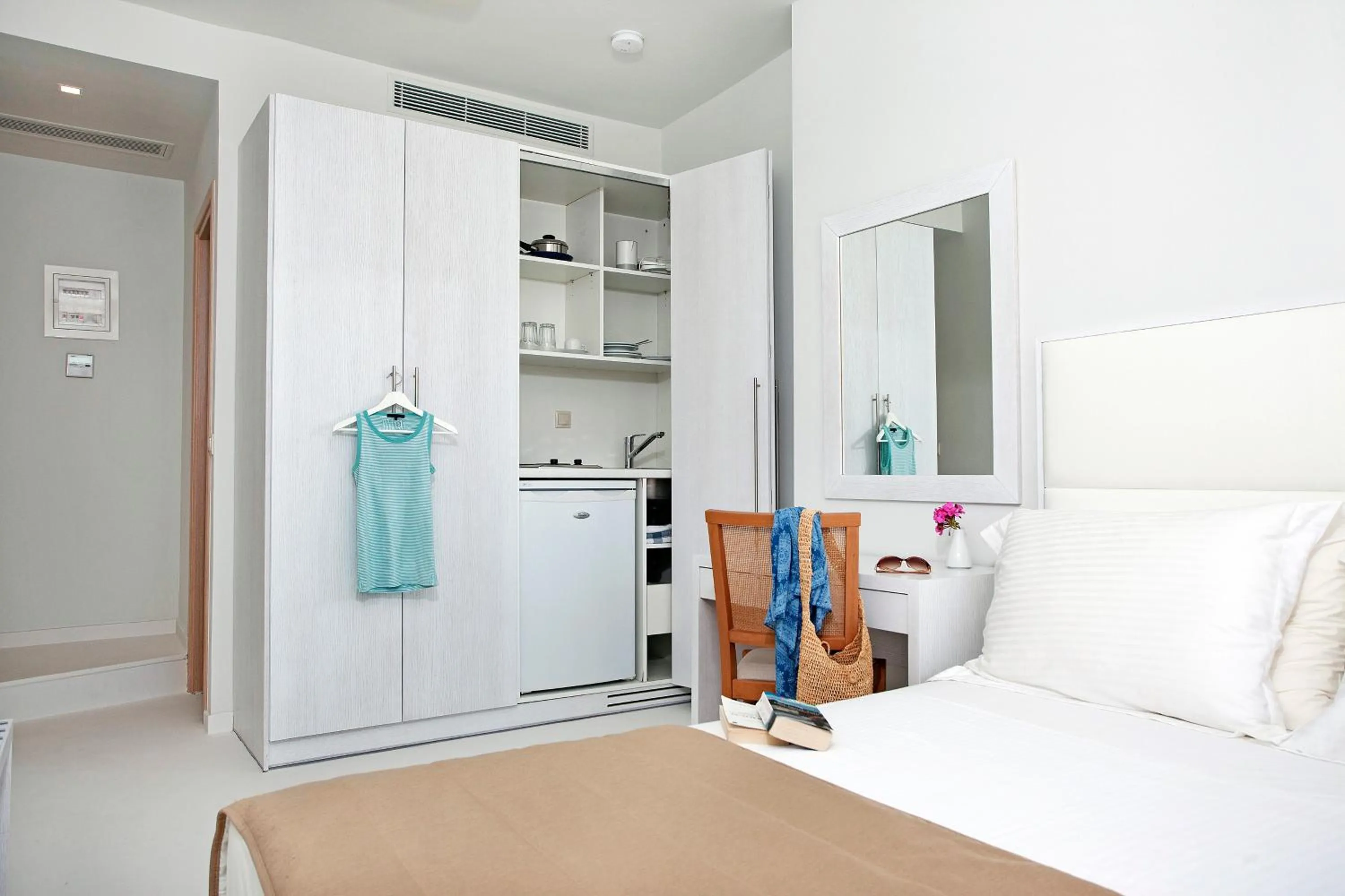 Photo of the whole room, Bed in Aphrodite Samos Suites