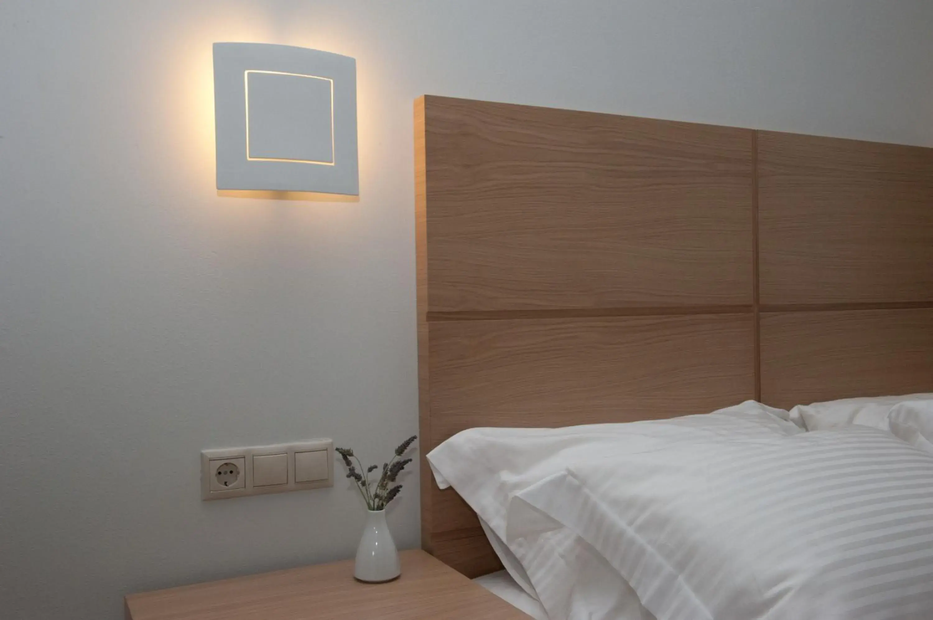 Decorative detail, Bed in Aphrodite Samos Suites Decorative detail, Bed in Aphrodite Samos Suites