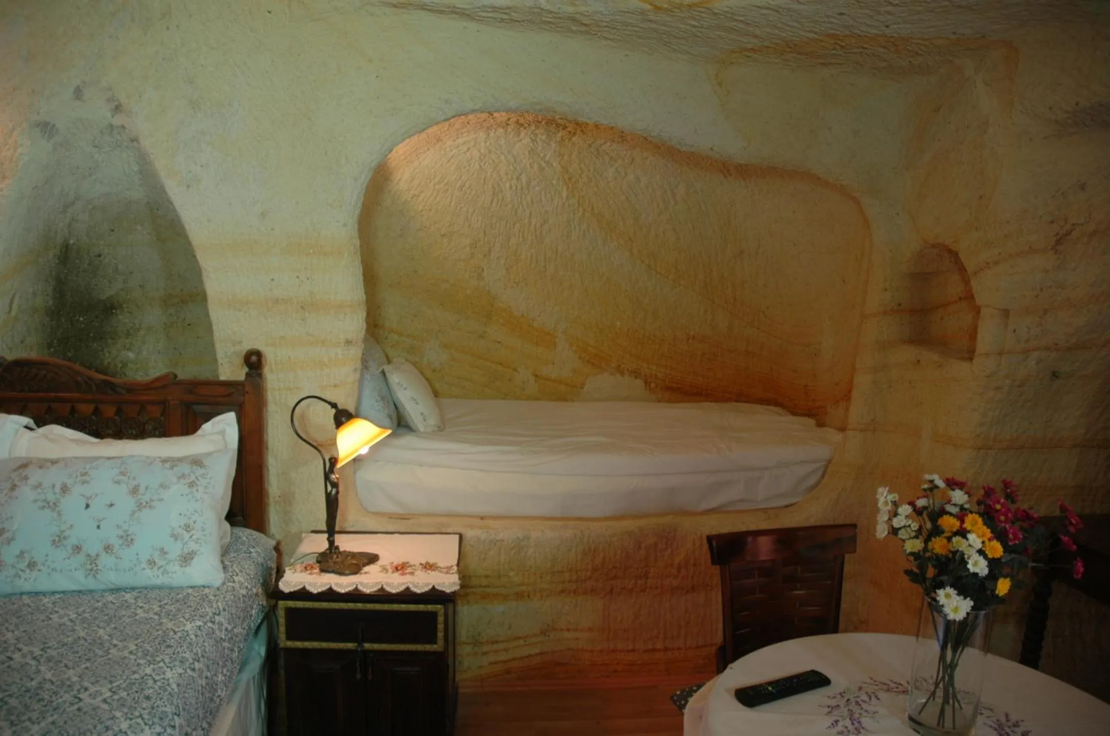 Bed in Elkep Evi Cave Hotel