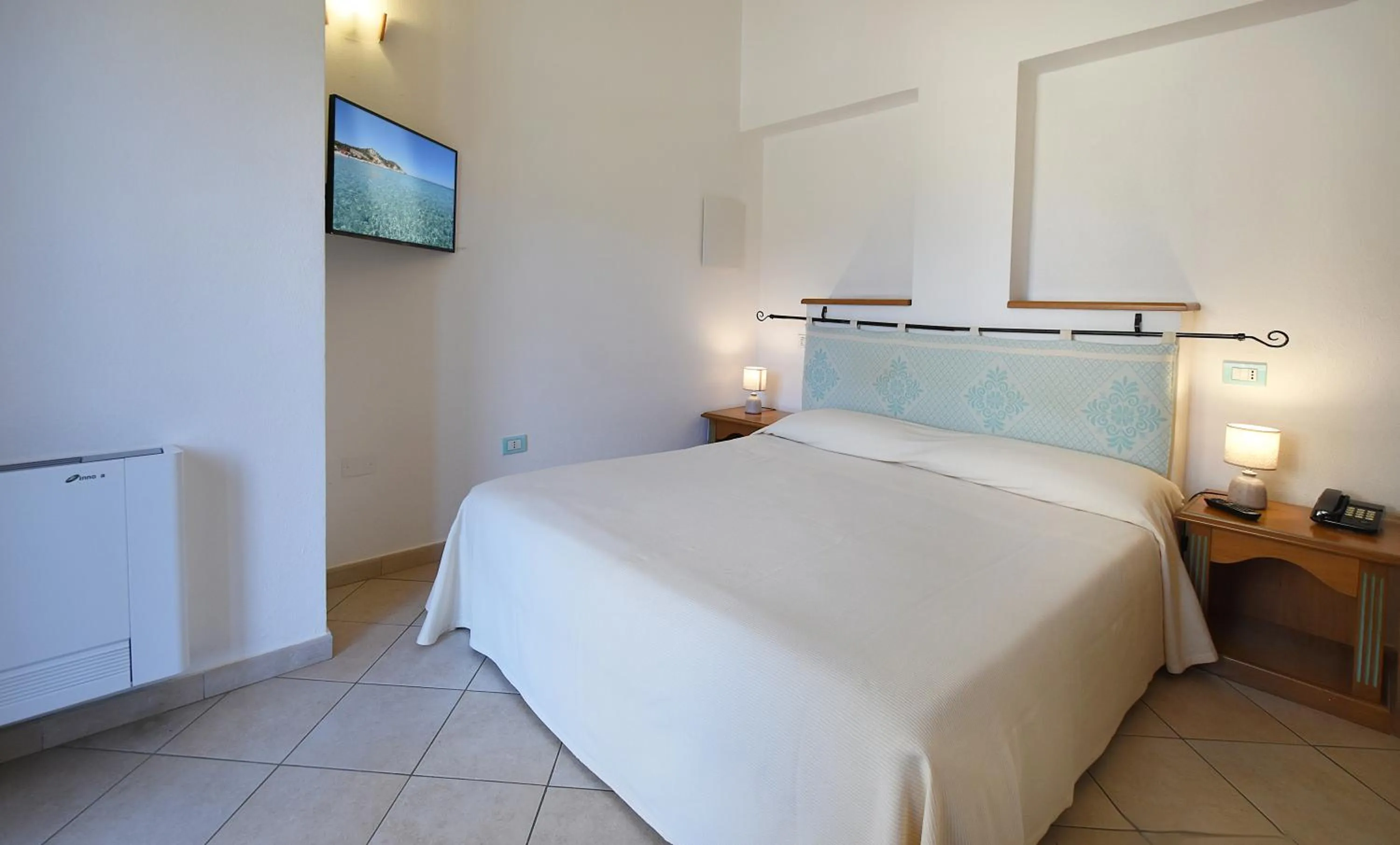 Bedroom, Bed in Le Anfore Hotel