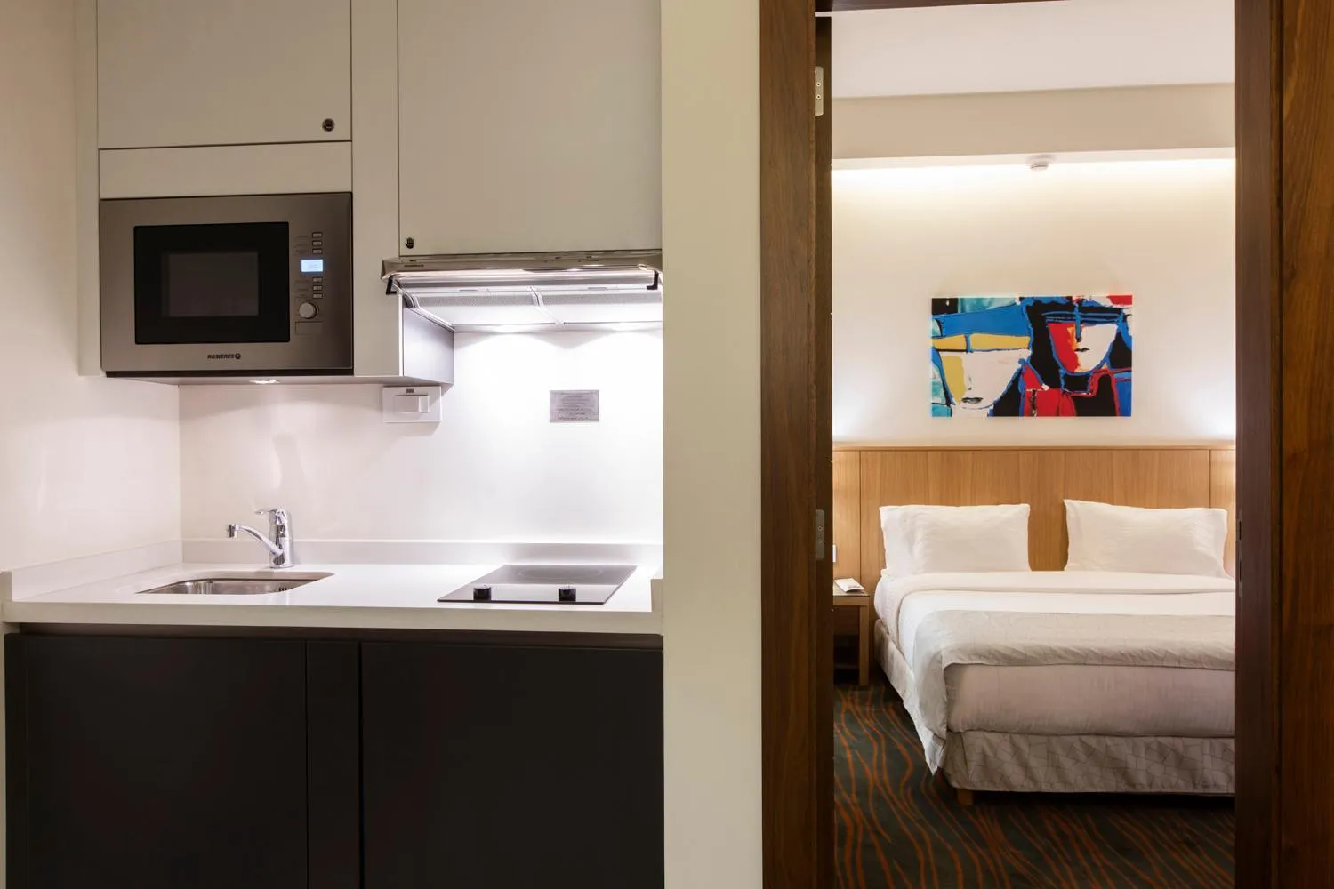 Kitchen or kitchenette, Bed in Citea Apart Hotel