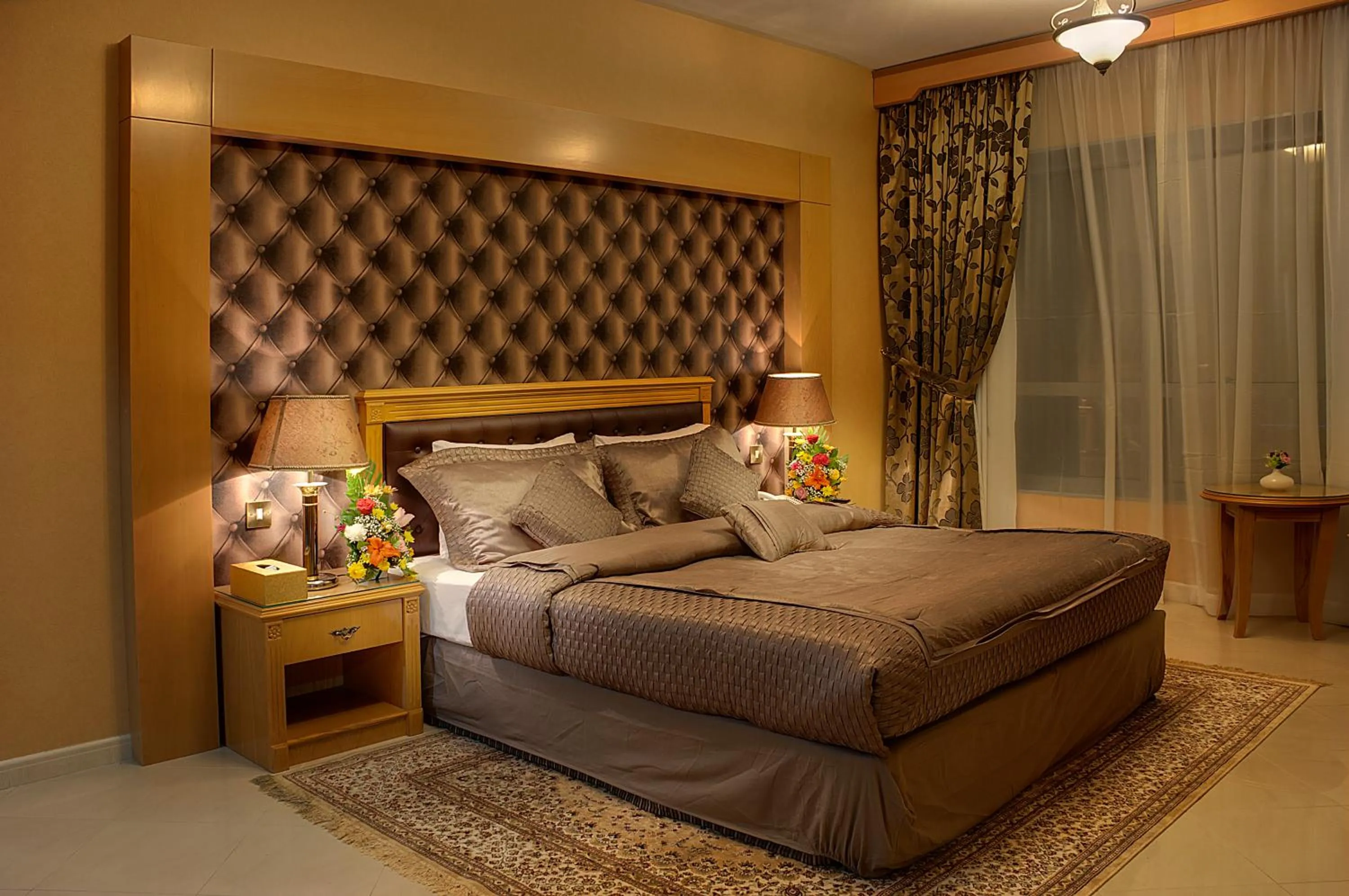 Bed in Deira Suites Deluxe Hotel Suites