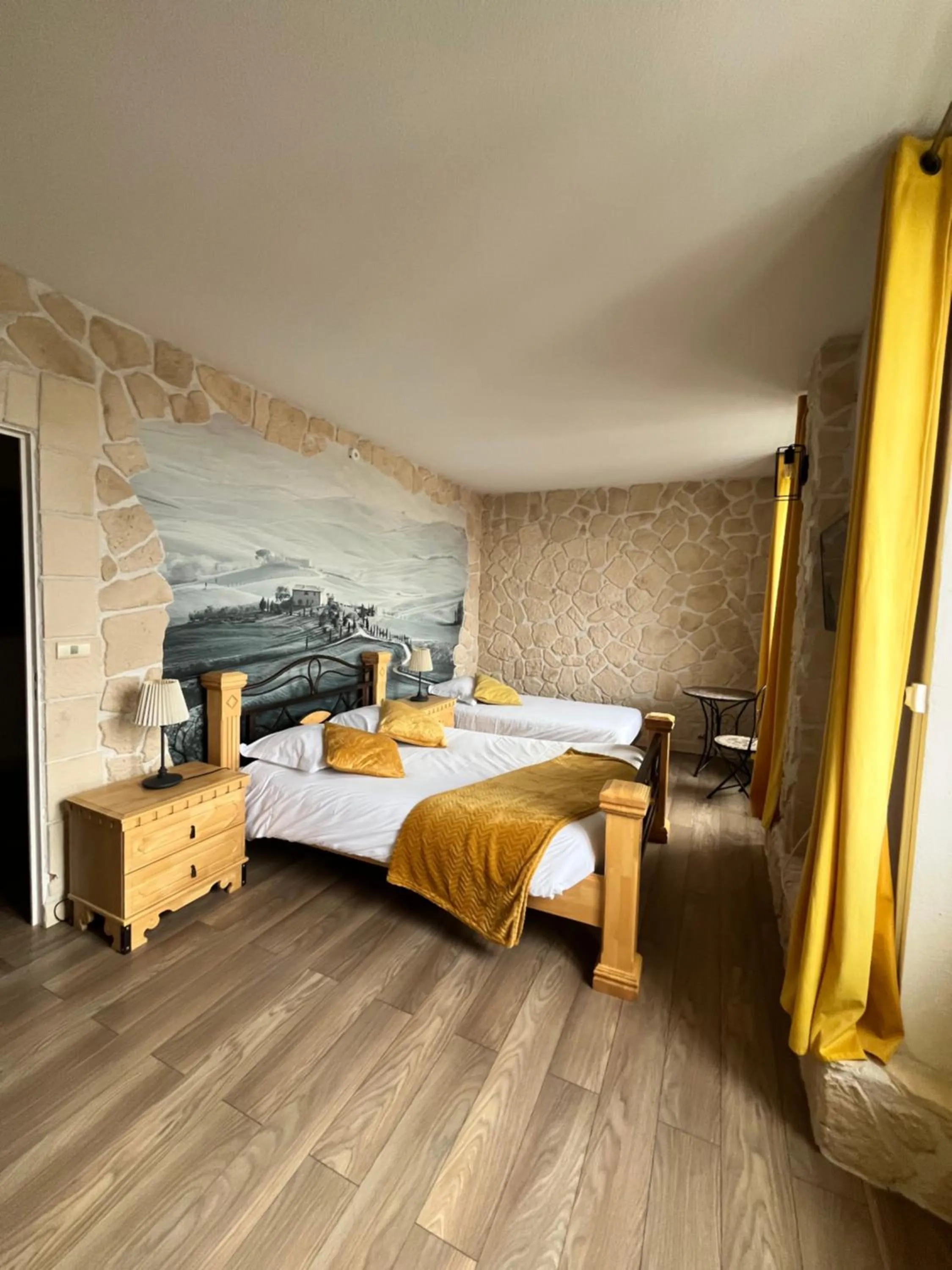 Photo of the whole room, Bed in Hôtel de Bretagne