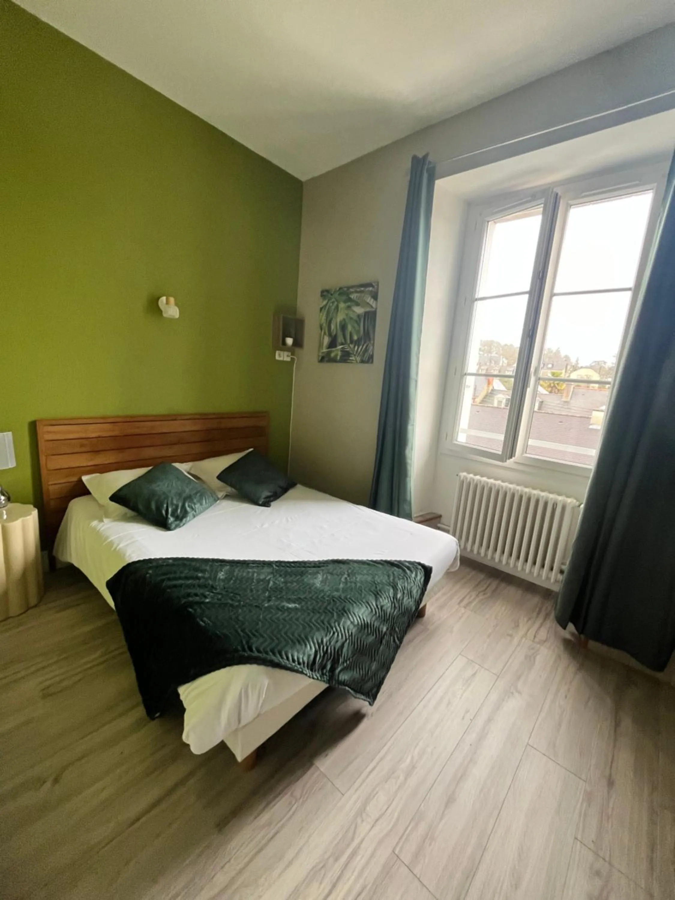 Photo of the whole room, Bed in Hôtel de Bretagne