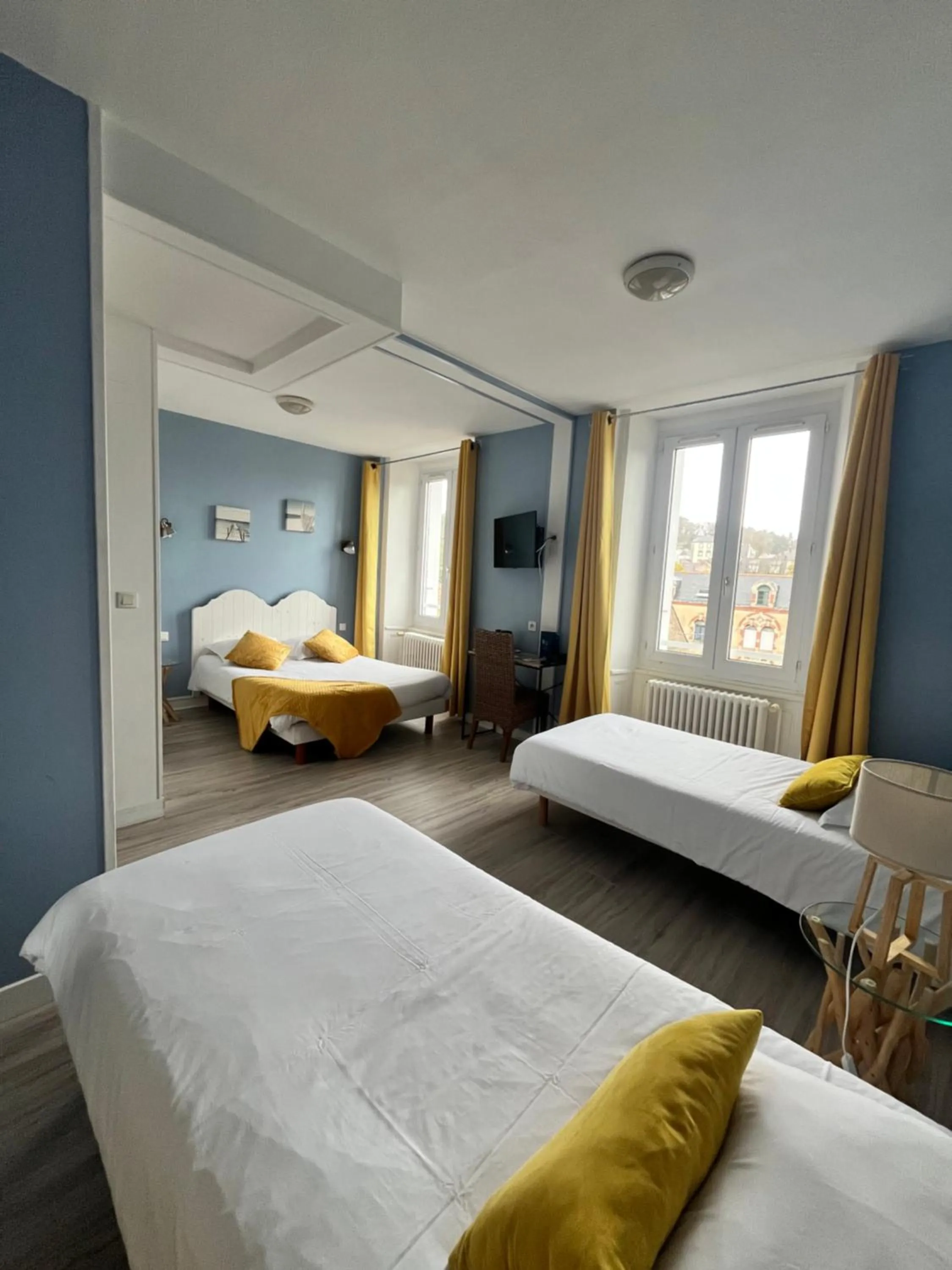 Photo of the whole room, Bed in Hôtel de Bretagne