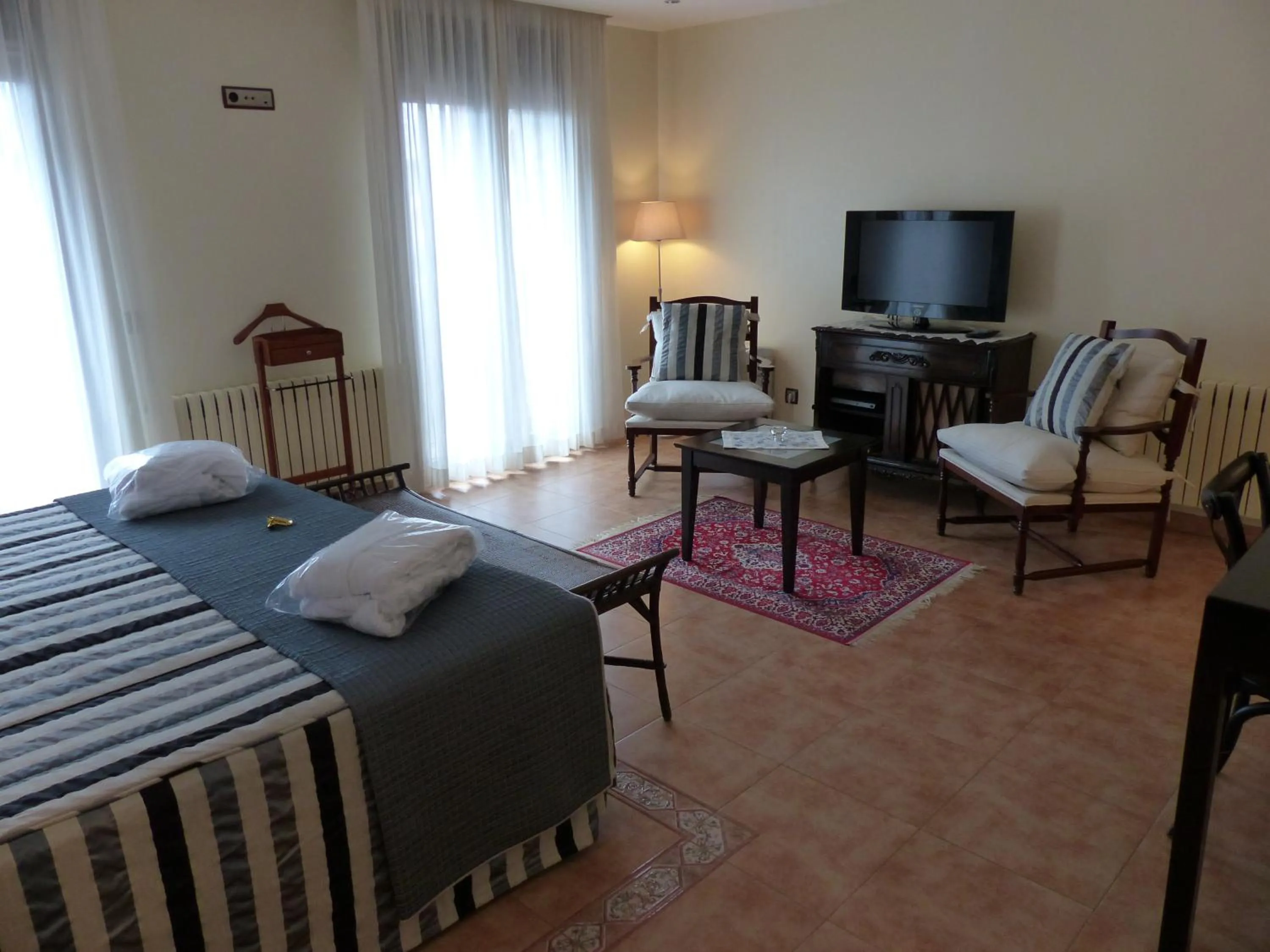 Photo of the whole room, Bed in Hotel Les Truites Adults only