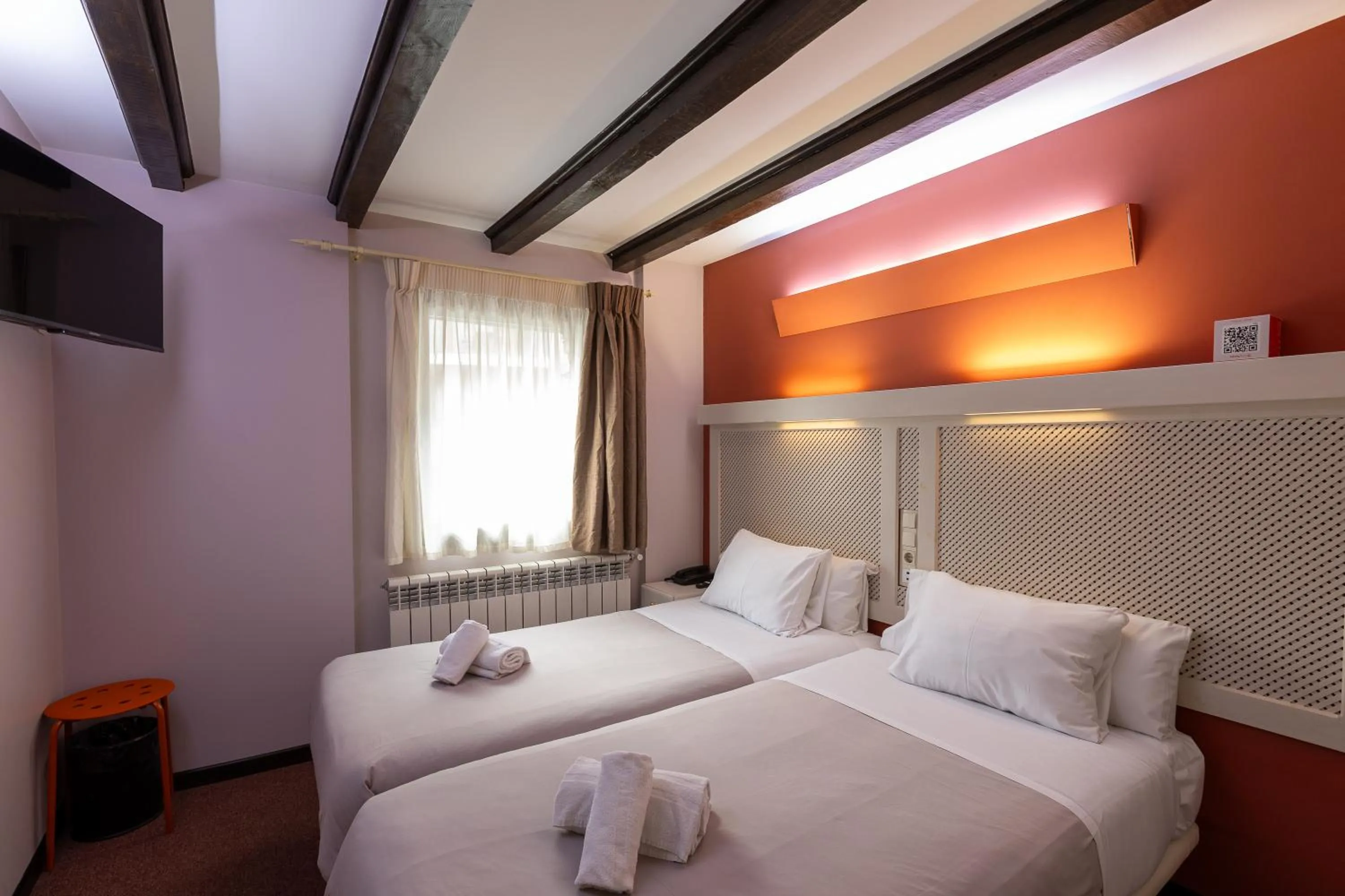 Bed in Hotel Micolau